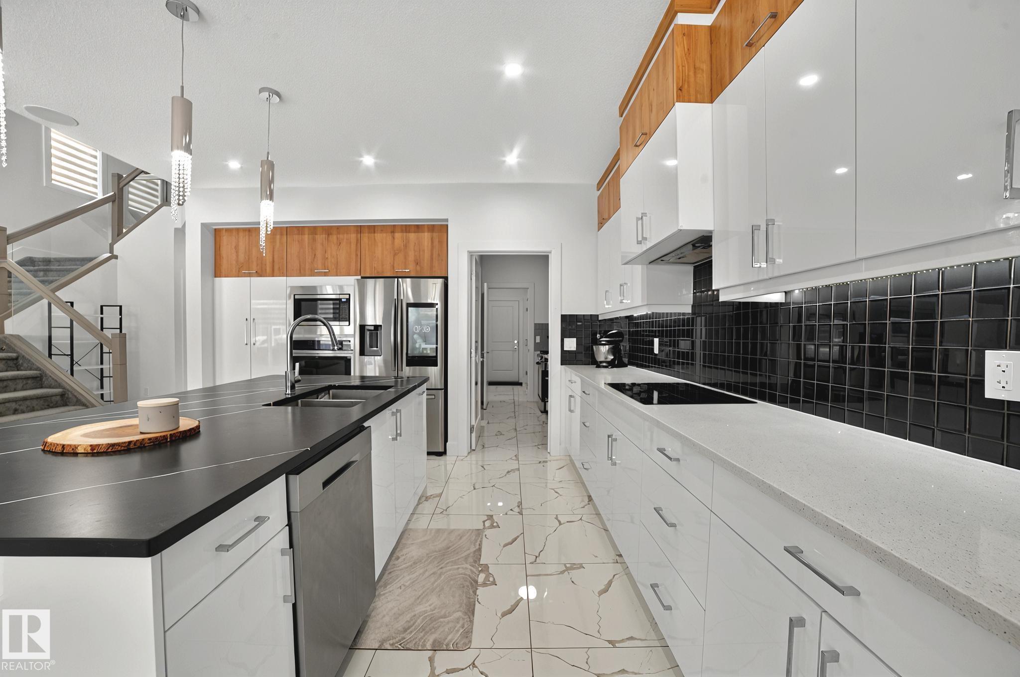 Photo 16 at 15023 15 Street NW, Fraser, Edmonton