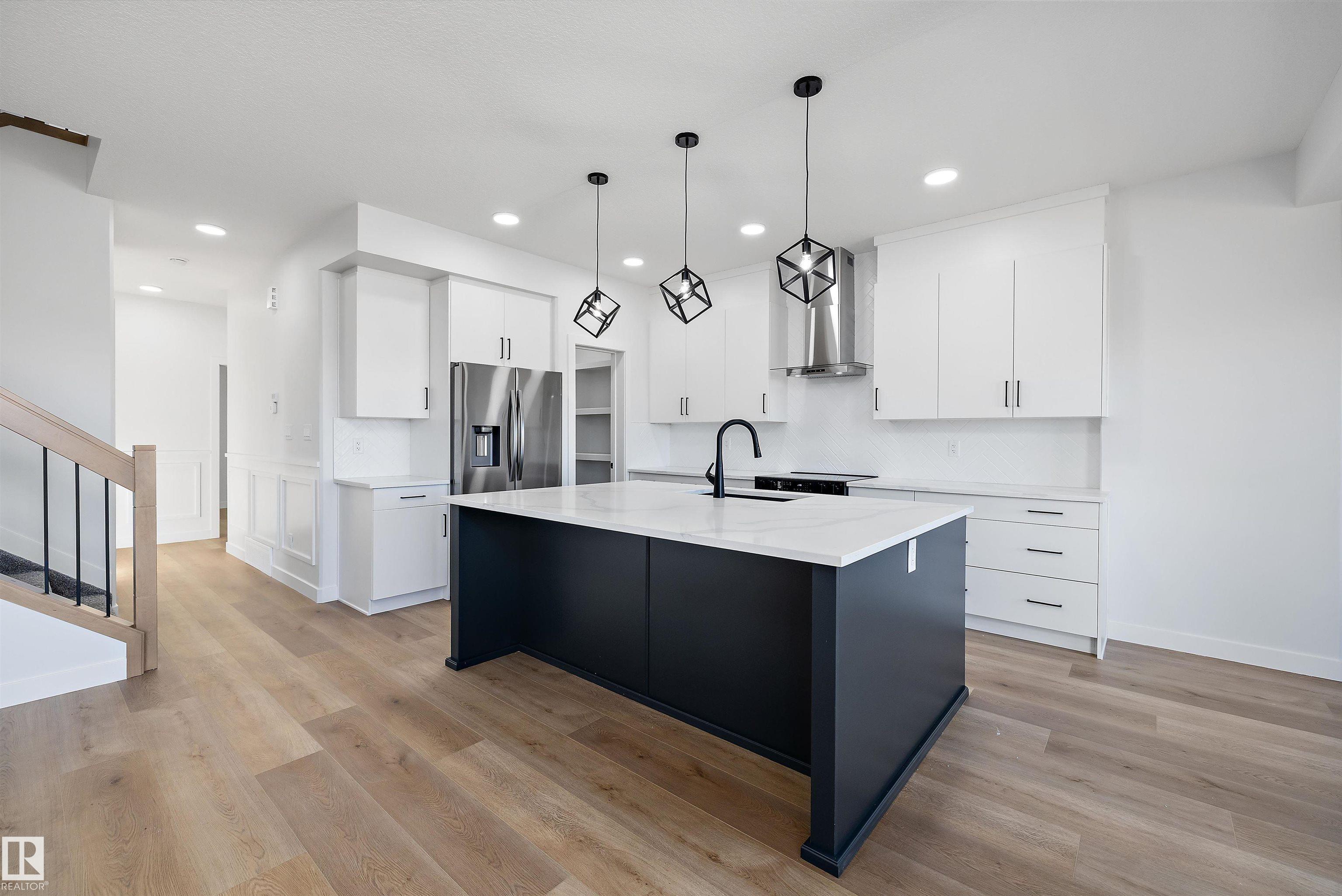 Photo 13 at 28 Chartres, Chérot, St. Albert