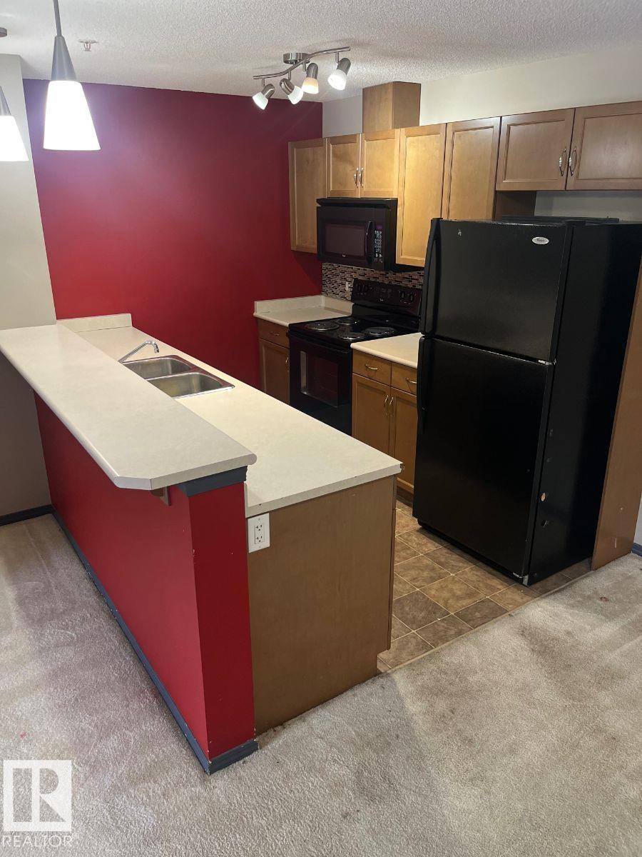 Photo 10 at 231 - 1180 Hyndman Road NW, Canon Ridge, Edmonton