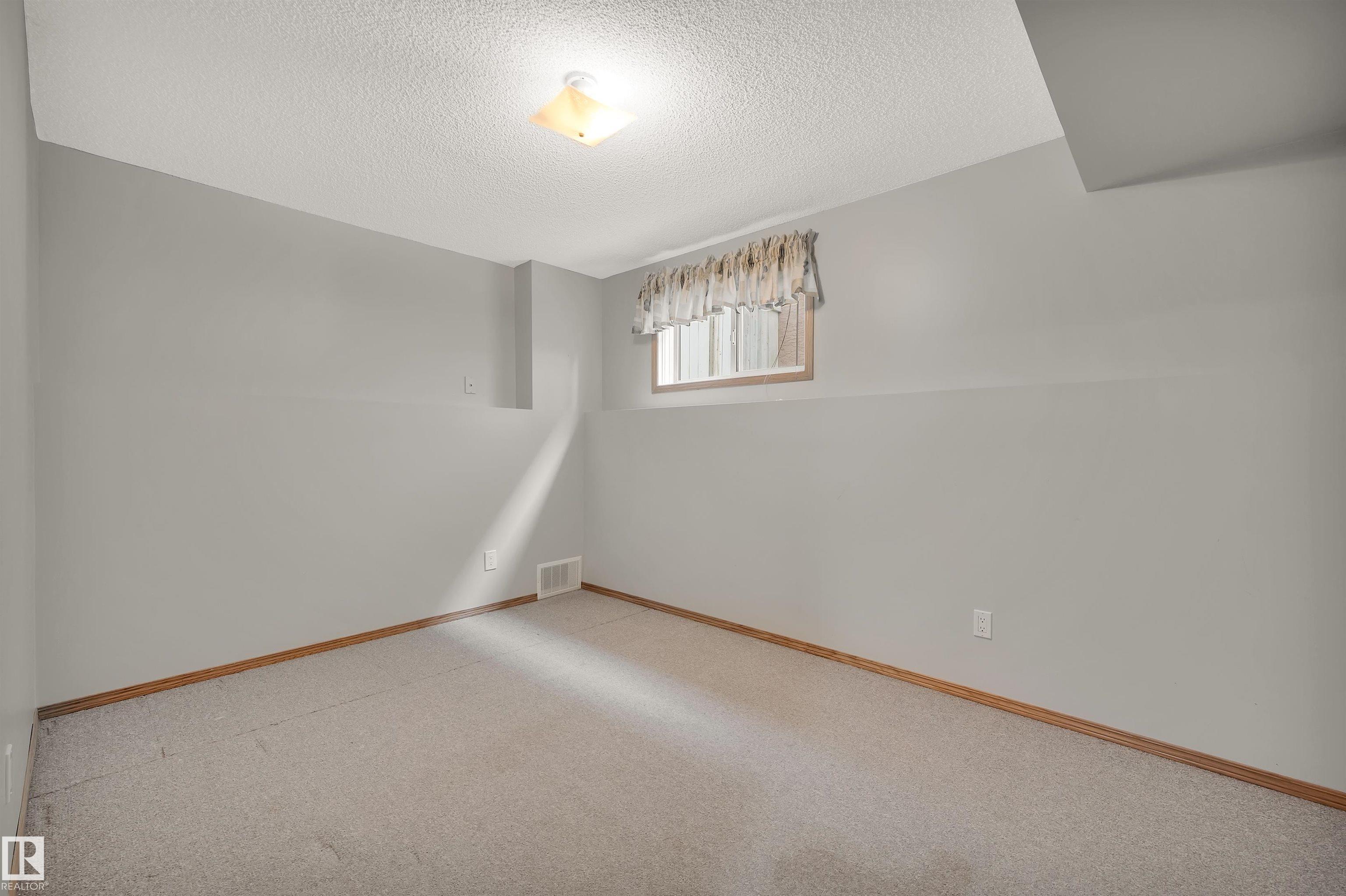 Photo 31 at 3410 135a Avenue NW, Belmont, Edmonton