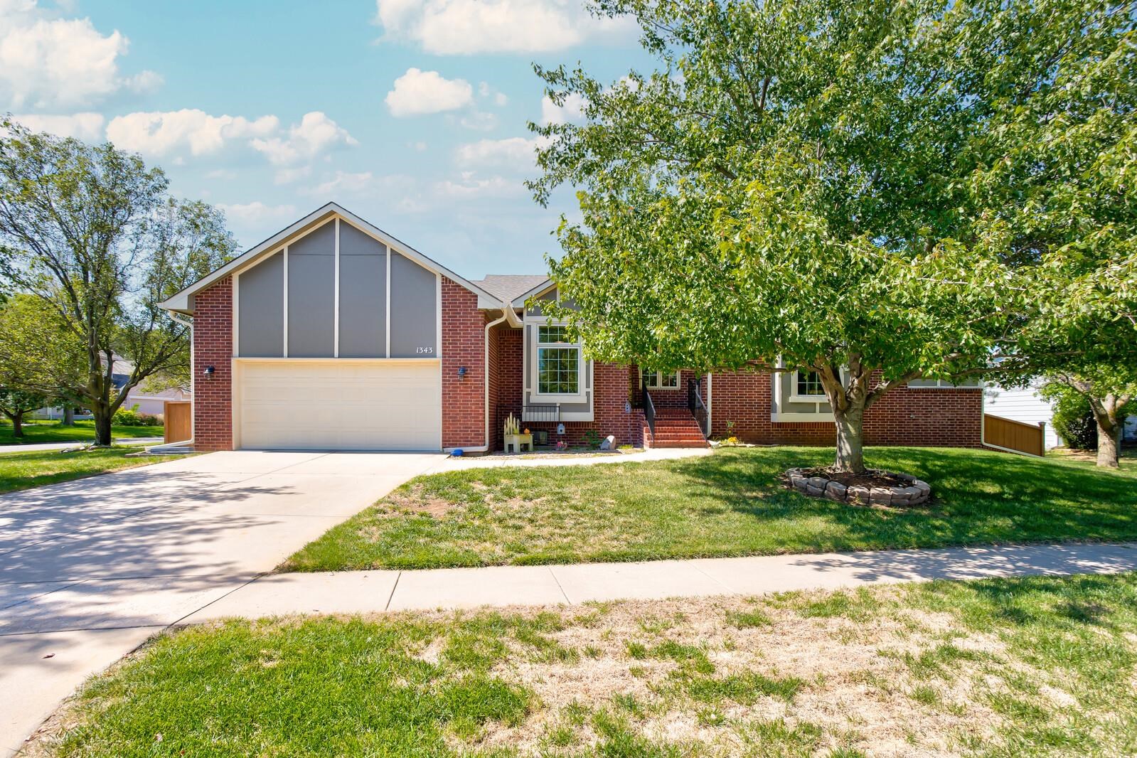 One Owner Ranch in Derby!  Situated on a corner Lot with Full Views of the Neighborhood Stocked Pond
