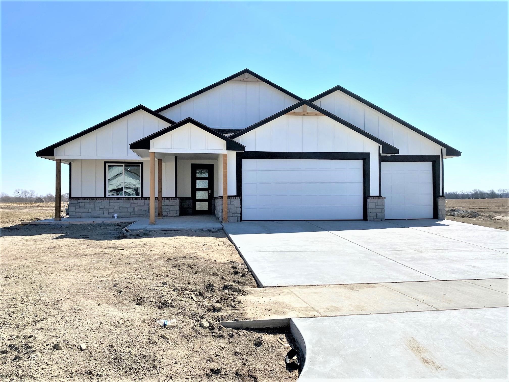 Come see this no step entry home in the beautiful Clear Ridge Development! The home features 3 bedro