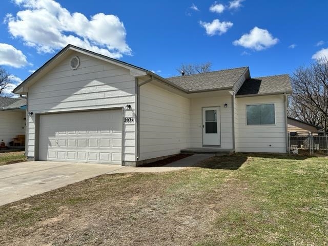 Updated 4 bedroom 2 bathroom home in north Wichita. Freshly painted interior with new carpet and lux