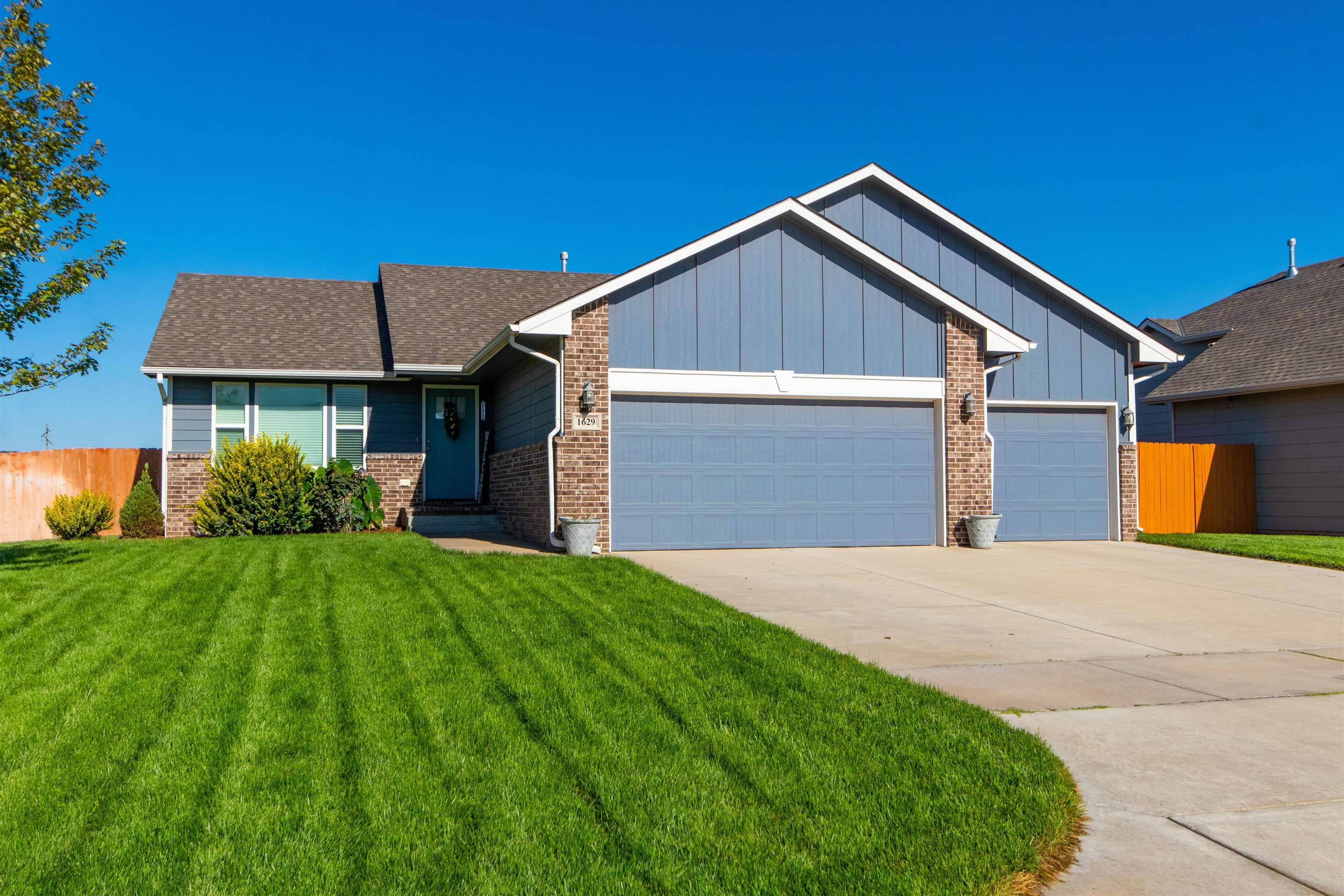 Beautiful Northwest Wichita home on a spacious corner lot! Come live in a new and exclusive neighbor