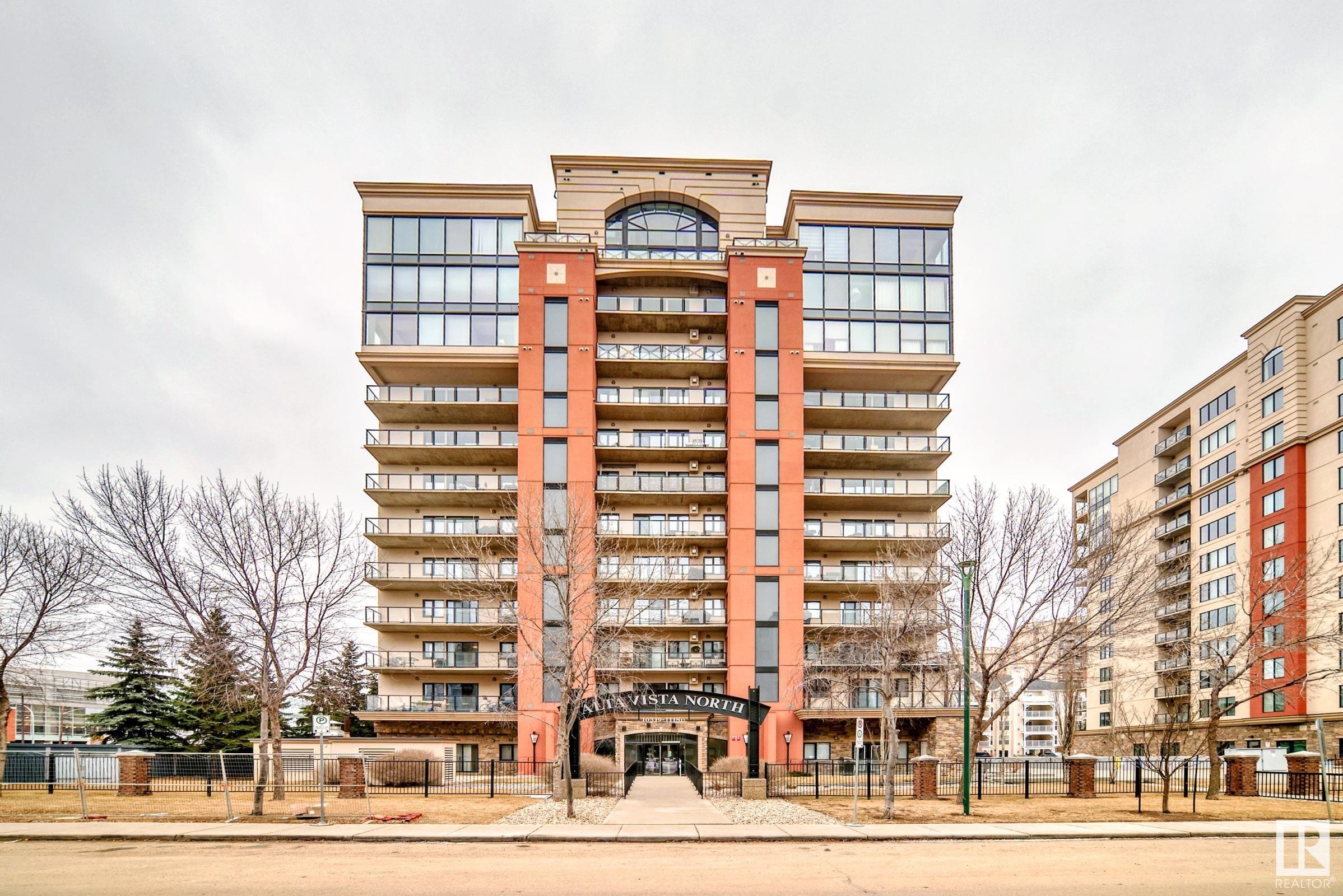 Welcome to Alta Vista! This concrete building is situated in the heart of it all + walking distance to the Downtown, Ice District, Grant Macewan, shopping, restaurants and more! This 8th floor unit has an open floor plan with over 1003 sq.ft., 2 bedrooms, 2 bathrooms,  insuite laundry + u/g parking. There is hardwood flooring throughout, with contemporary paint tones, lighting + tile flooring in the bathrooms. The kitchen is a culinary masterpiece including a large island with butcher-block countertop, maple cabinets, s/s appliances + u/c lighting. The spacious primary suite features a large w/in closet + full 4-piece ensuite with tub + shower. The second bedroom also has a large w/in closet, with a full 4-piece bathroom adjacent to it. The 2 bedrooms are separated to each side of the unit for added privacy. The west-facing view is spectacular, with a spacious balcony, gas bbq hook-up + storage room. Amenities include a guest suite, fitness + social room, + on-site manager. This unit is move-in ready!