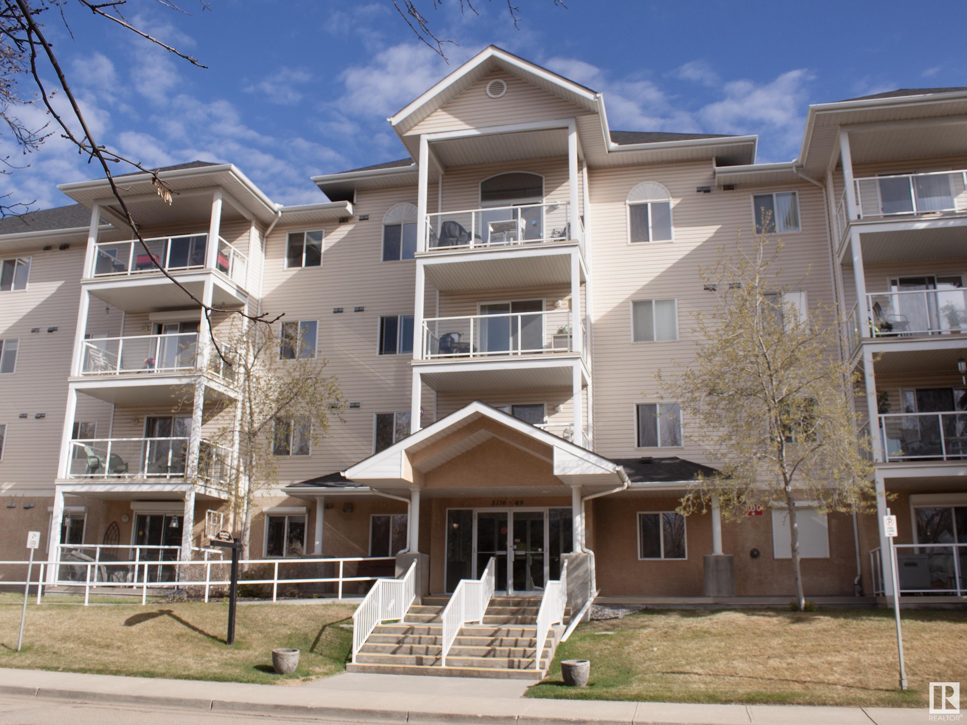 Welcome to this beautifully maintained 2-bedroom, 2-bathroom condominium in an adult-living building ideally situated just minutes from downtown Leduc, shopping, and an array of restaurants. This inviting unit offers both comfort and convenience in a great location. Step inside to find new laminate flooring in the kitchen, dining area, and entrance, creating a fresh and modern feel. The kitchen features a brand-new dishwasher and flows seamlessly into the open-concept dining and living areas—perfect for entertaining or quiet nights in. Both bedrooms are filled with generous natural light during the day, with the primary bedroom offering the added privacy of a 3-piece ensuite bathroom. A second full bathroom and in-suite laundry add to the functionality of this well-designed home. Enjoy the security and convenience of your own titled parking spot with a storage cage. Close to the Edmonton International Airport and area golf courses.