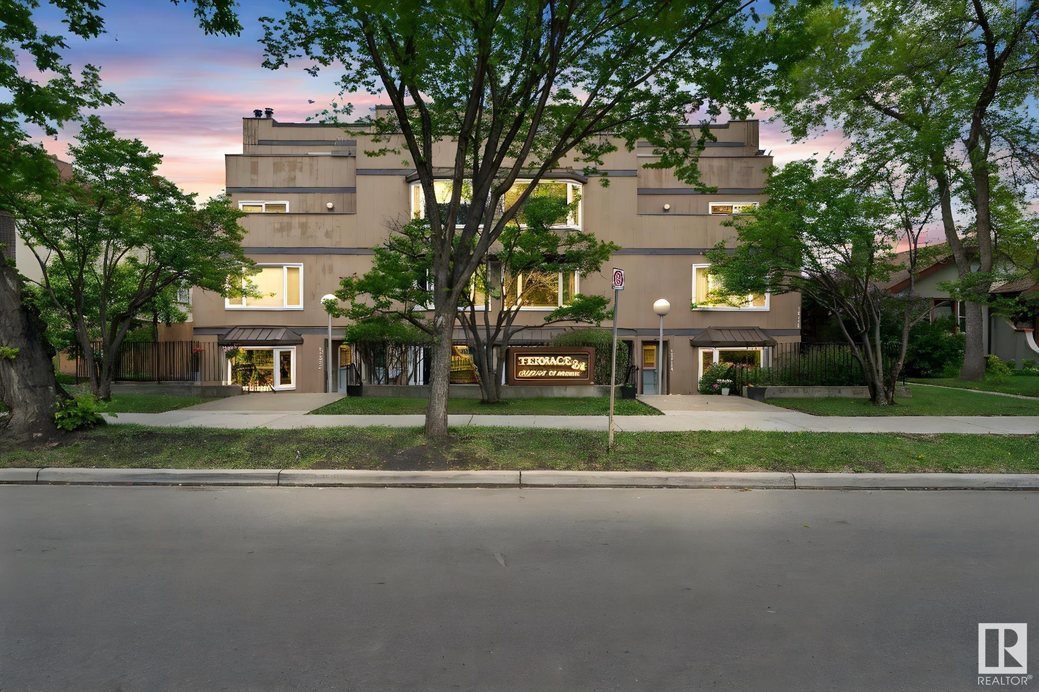 Welcome to Strathcona! Walking distance to Old Scona, U of A, Whyte Avenue, Farmer's market and river valley, this location has it all! With over 1185 sq.ft., this 2-story loft style unit boasts an open plan sure to please those looking for some style with their living. As you enter, you are greeted with upgraded laminate in the living room with an open ceiling to the loft above. There is a gorgeous bay window overlooking the south yard, with a wood-burning fireplace for warmth and ambiance. The kitchen has painted cabinetry, s/s appliances and flows into the living and dining areas. The upper level loft is very functional and could be used for media, fitness, work from home or an artist's studio. The primary bedroom is spacious with dual closets and a view of the beautiful trees and park. On this level you will also find a 4-piece bathroom with jacuzzi soaker, and the insuite laundry. Complete the package with a covered parking stall and a front yard area with seating. Boutique building with a vibe!