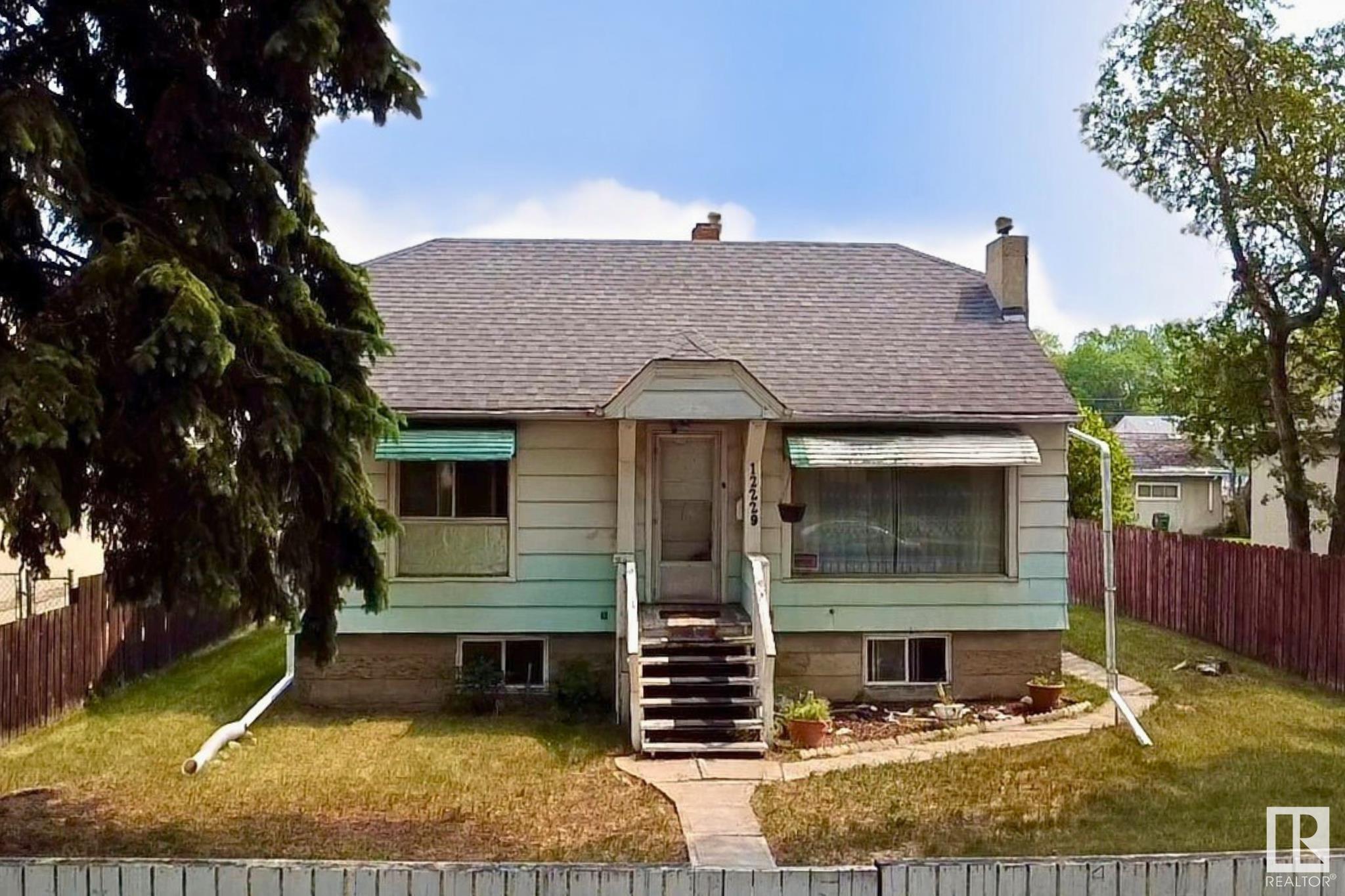 Investor Opportunity! Discover the potential in this massive 50x150 lot nestled in a mature, well-connected neighbourhood offering endless possibilities for redevelopment, subdivision, or a strategic hold-and-renovate. This long-term rental has served well for over 20 years and is ready for its next chapter. Whether you're an experienced investor or a visionary builder, the canvas is here, waiting for your creativity. The existing 4-bed, 1-bath bungalow offers solid bones and a functional layout, ideal for a flip, rental refresh, or interim hold while you plan your next steps. While the home does require some TLC and is being sold as-is, where-is, the true value lies in the lot and location. Just minutes from schools, public transit, the Yellowhead, shopping, and everyday essentials, this is a golden opportunity to plant roots—or build equity—in one of the city’s most accessible pockets. Whether your plan is building, flipping, subdividing, or holding, this property is project-ready.