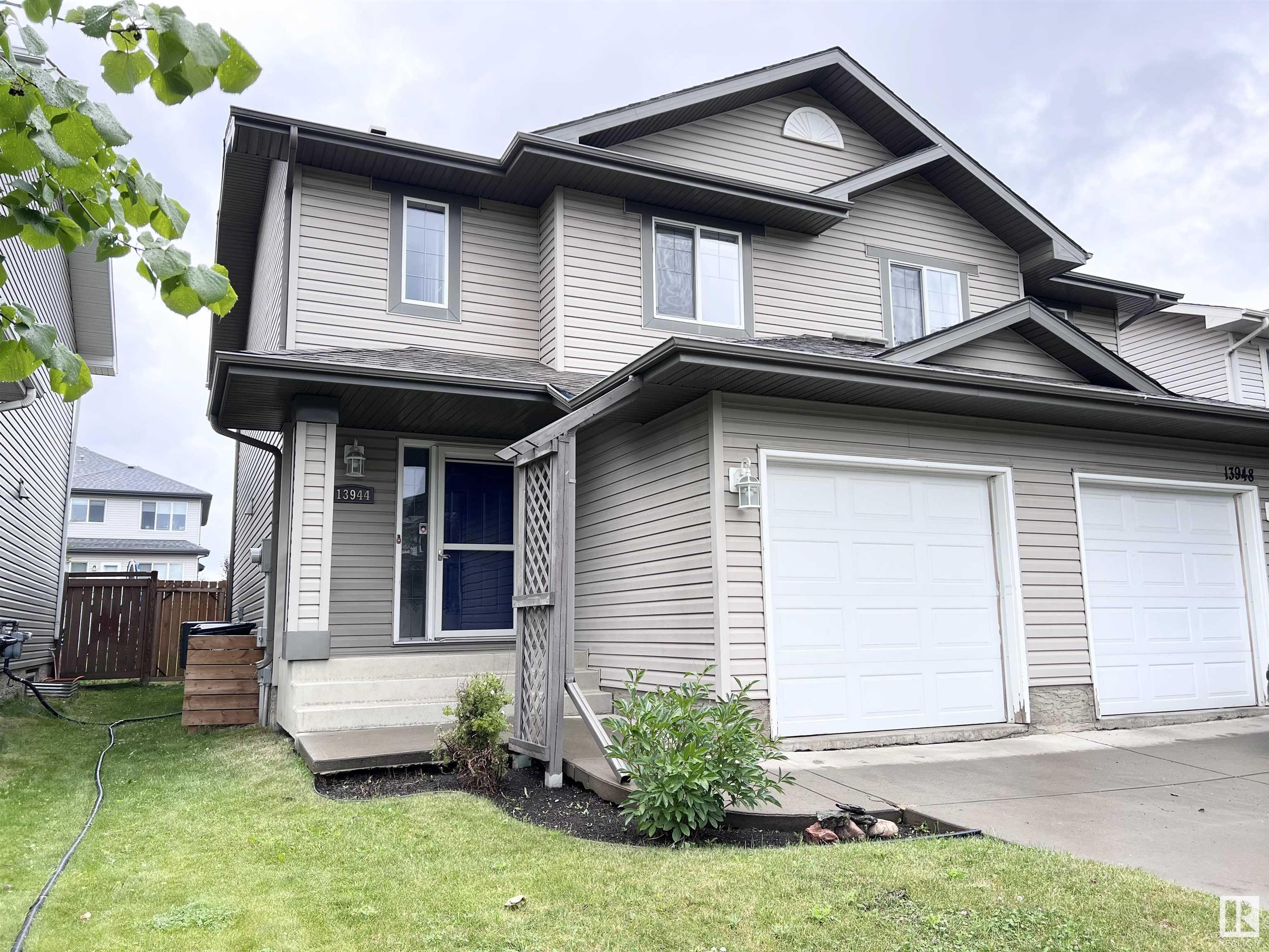 Wonderful 2 storey half duplex with fully finished basement and single attached garage in the north west neighbourhood of Hudson sitting on a large lot. The main level features a bright open layout, kitchen with an overhang breakfast counter and makes for an excellent social hub, dining space with convenient patio door to the west facing backyard, living room with gas fireplace and ample windows for all that natural sunlight from the west and 2 piece bathroom. The upper floor hosts 2 primary bedrooms each with private 4 piece en suites with windows and large walk in closets. The basement features suspended ceilings, a third bedroom, 2nd living room or recreation space, with office/tech space and built in desk and laundry room. The backyard is fully fenced and landscaped with deck area. This lovely air conditioned home comes complete with all appliances and windows coverings. Located near Pembina Lake, public transportation, shopping and local eateries. Don't miss out on this gem with QUICK POSSESSION.