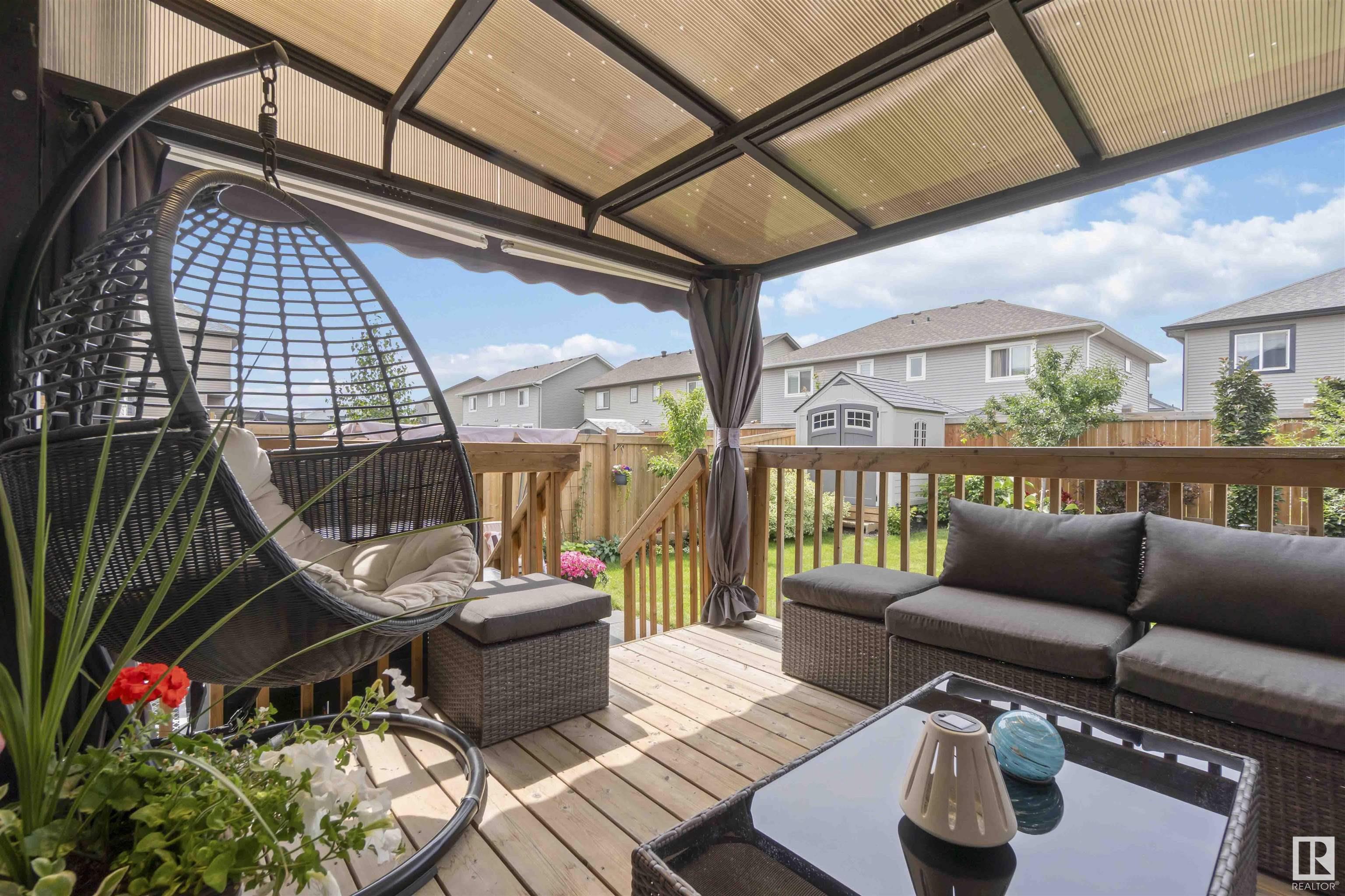 Welcome to this IMMACULATE 3 Bedroom Home with a MAGICAL GARDEN RETREAT! This gem welcomes you with a GRAND FOYER, open-concept kitchen with QUARTZ countertops, STAINLESS STEEL appliances, exquisite BACKSPLASH and pantry. The spacious living and dining rooms lead you to a DREAM BACKYARD featuring a stunning DECK, GAZEBO, an AWNING for EXTRA SHADE on your BBQ PATIO, a gorgeous STORAGE SHED and LUSH PLANTING strategically placed for spring & summer all round blooms. Upstairs includes a primary suite with a WALK-IN CLOSET and 5-pc ENSUITE, two additional bedrooms, a full 4-PC bath, a spacious BONUS ROOM and an upstairs laundry room. The FINISHED BASEMENT offers a SEPARATE SIDE ENTRANCE, a LARGE REC ROOM for entertainment, extra storage and play space. Stay cool inside with central A/C and enjoy a well organized DOUBLE ATTACHED GARAGE with tons of SHELVING and a WORKBENCH. This one’s a rare find - full of charm, comfort and nature-infused tranquility!