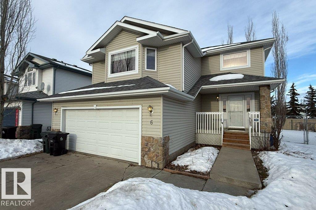 Backing directly onto parkland and scenic walking trails, this well-built 2-storey home offers 2,056 sq. ft. of living space in a quiet cul-de-sac. Located on a large pie-shaped lot with no rear neighbours, the property delivers privacy, green space views, and exceptional outdoor enjoyment. The main floor features an open-concept kitchen with island and corner pantry, a bright dining nook with direct access to a spacious 312 sq. ft. deck overlooking the park, and a functional mudroom with main-floor laundry and a 2-piece bath conveniently located off the double attached garage. Upstairs includes three generous bedrooms, highlighted by a spacious primary retreat with walk-in closet and private ensuite. A vaulted bonus room with a built-in window bench creates the perfect family or flex space. The fully finished basement adds a fourth bedroom, a 3-piece bathroom, and a large recreation room. Ideally located with quick access to Highway 16A, commuting to Edmonton and surrounding communities is easy while