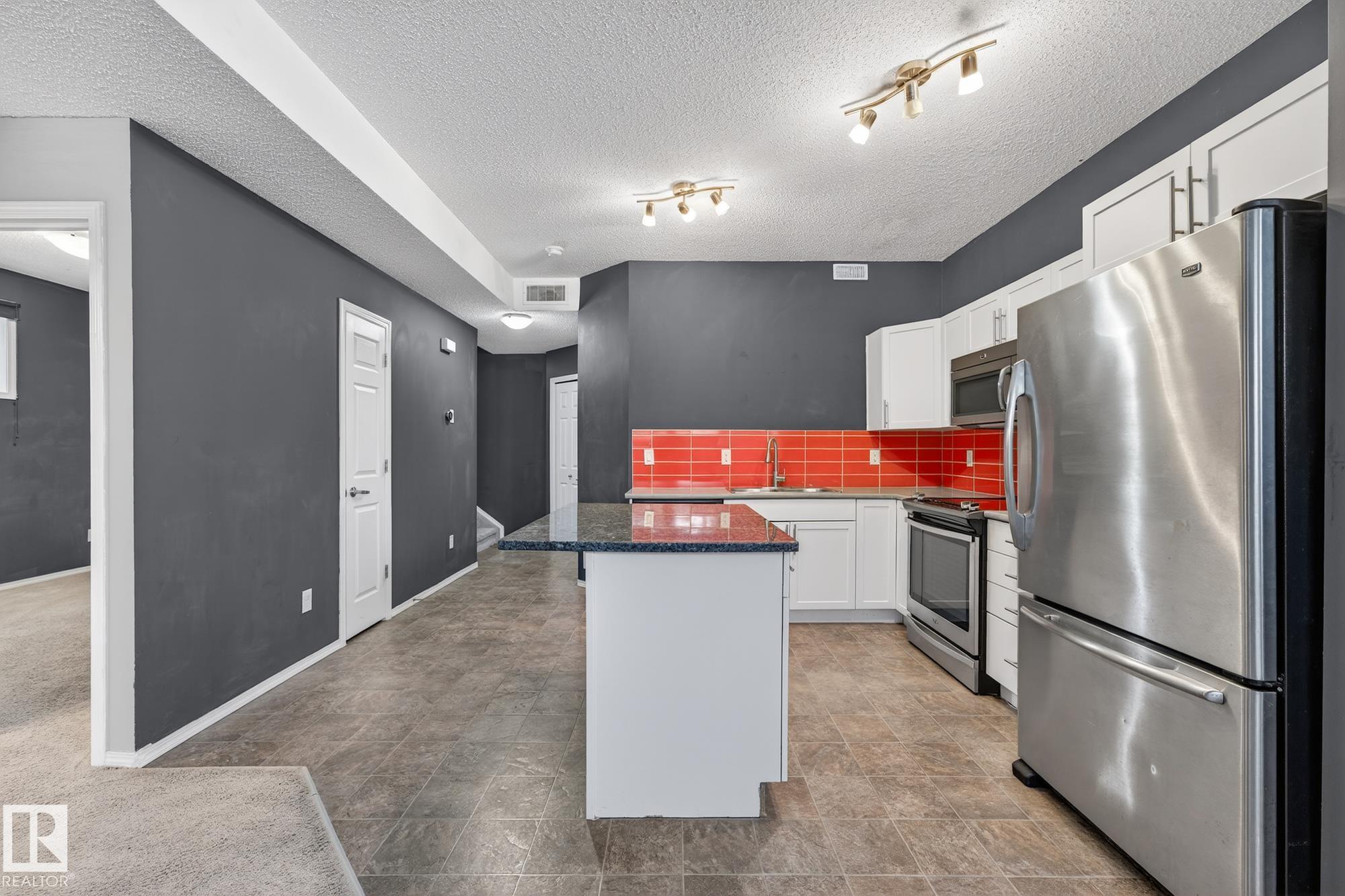 Photo 8 at 19 - 6520 2 Avenue SW, Charlesworth, Edmonton