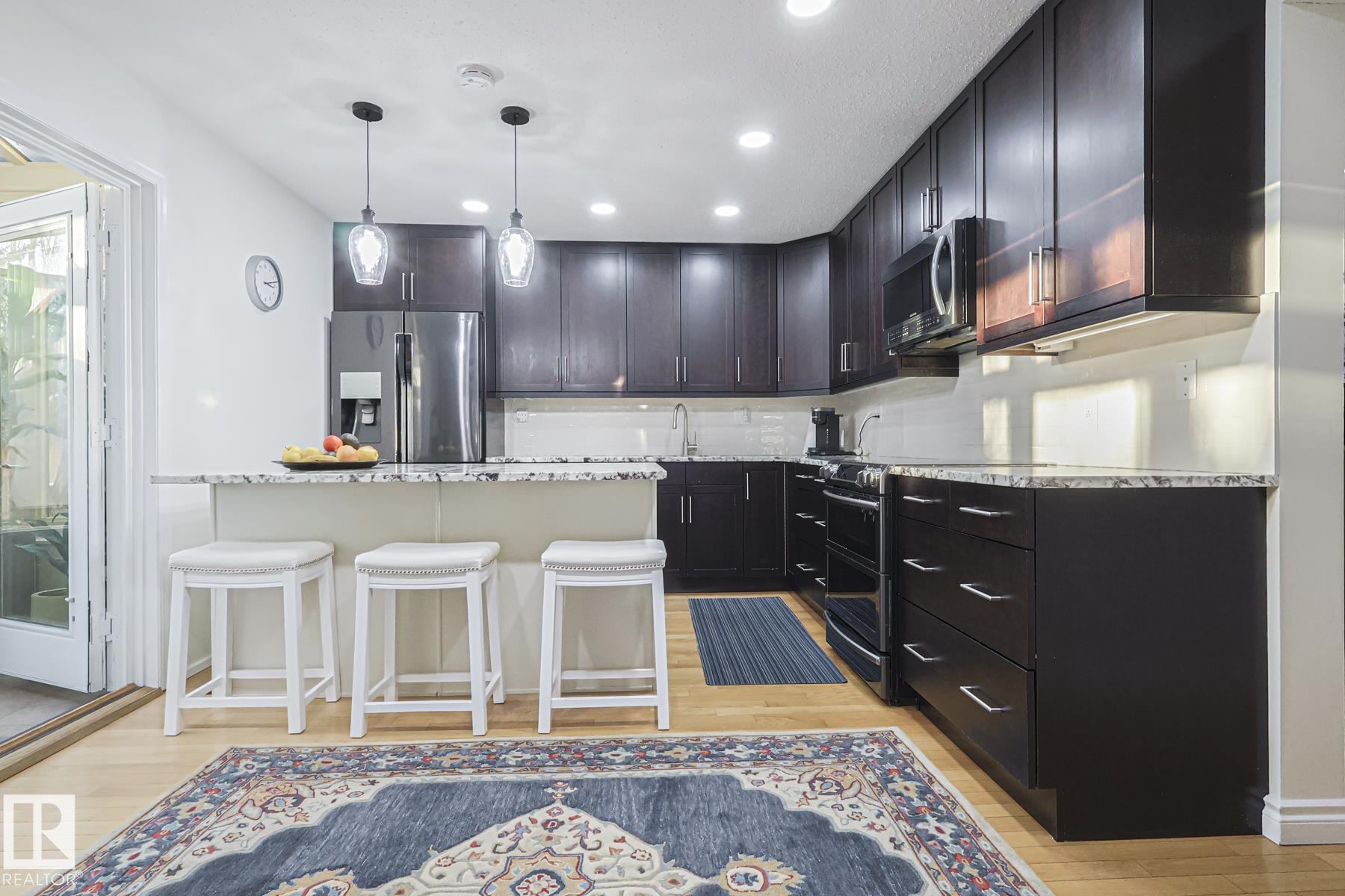 Photo 11 at 17607 55 Avenue NW, Gariepy, Edmonton