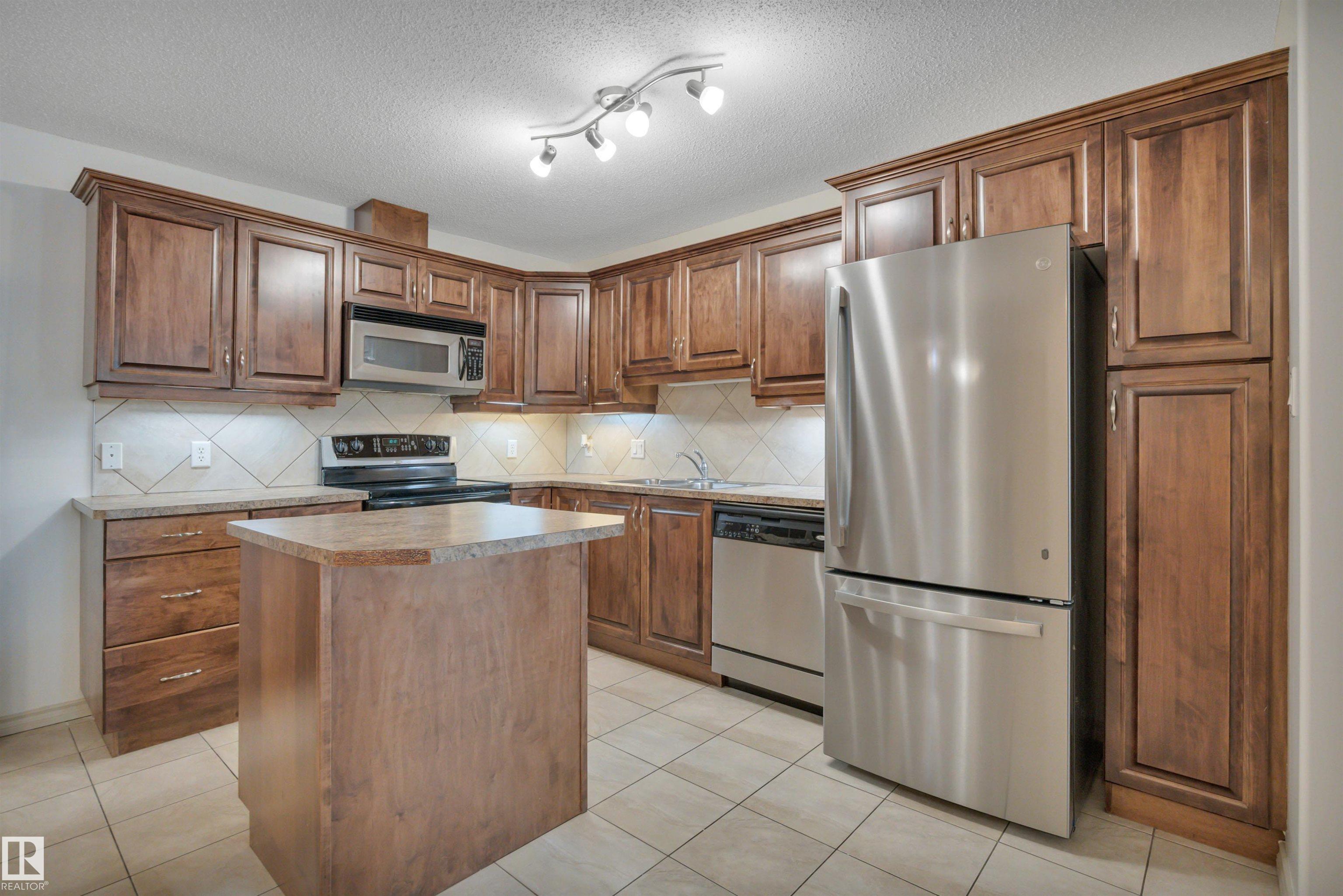 Photo 12 at 119 - 16035 132 Street NW, Oxford, Edmonton