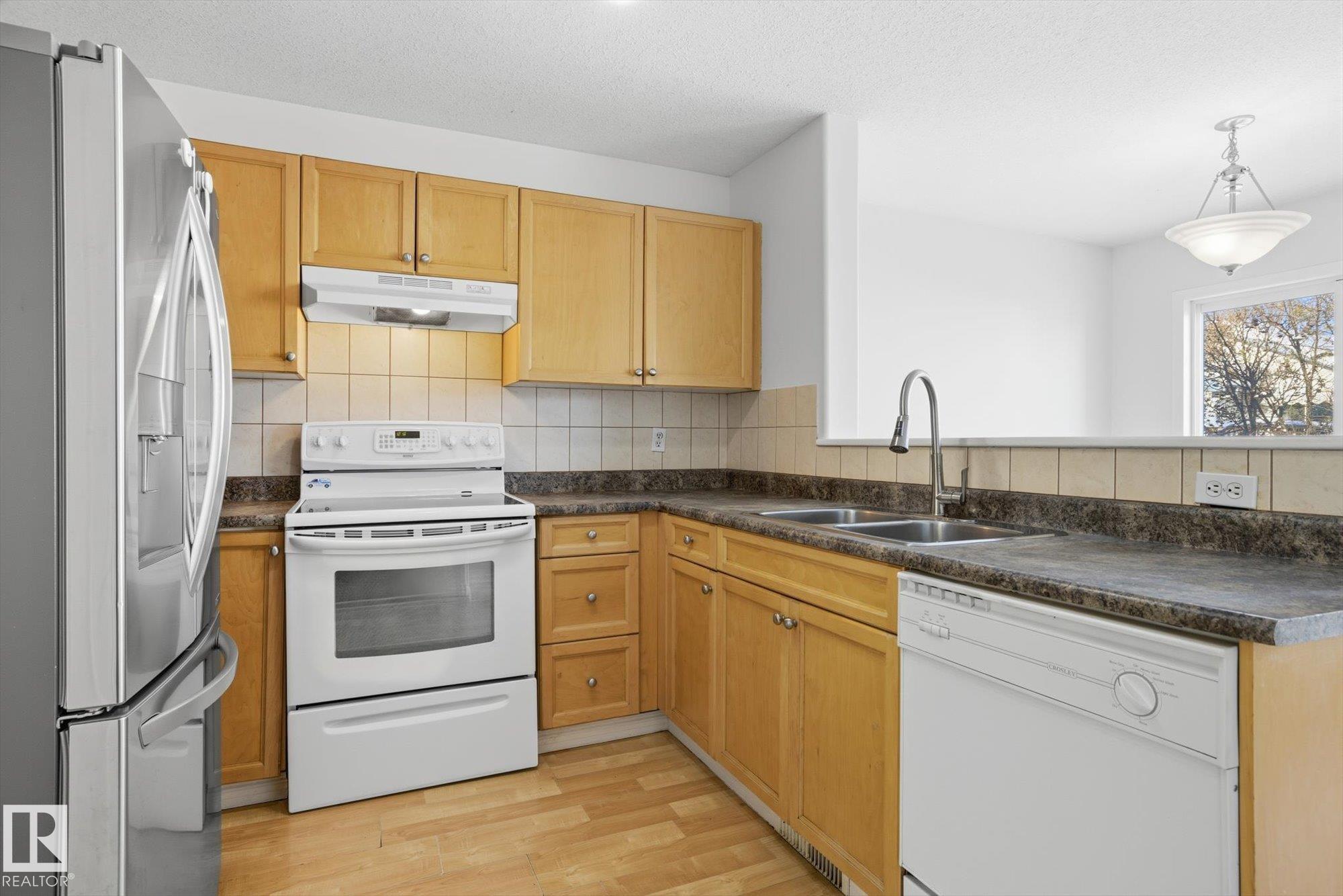 Photo 12 at 17 - 16933 115 Street NW, Canossa, Edmonton