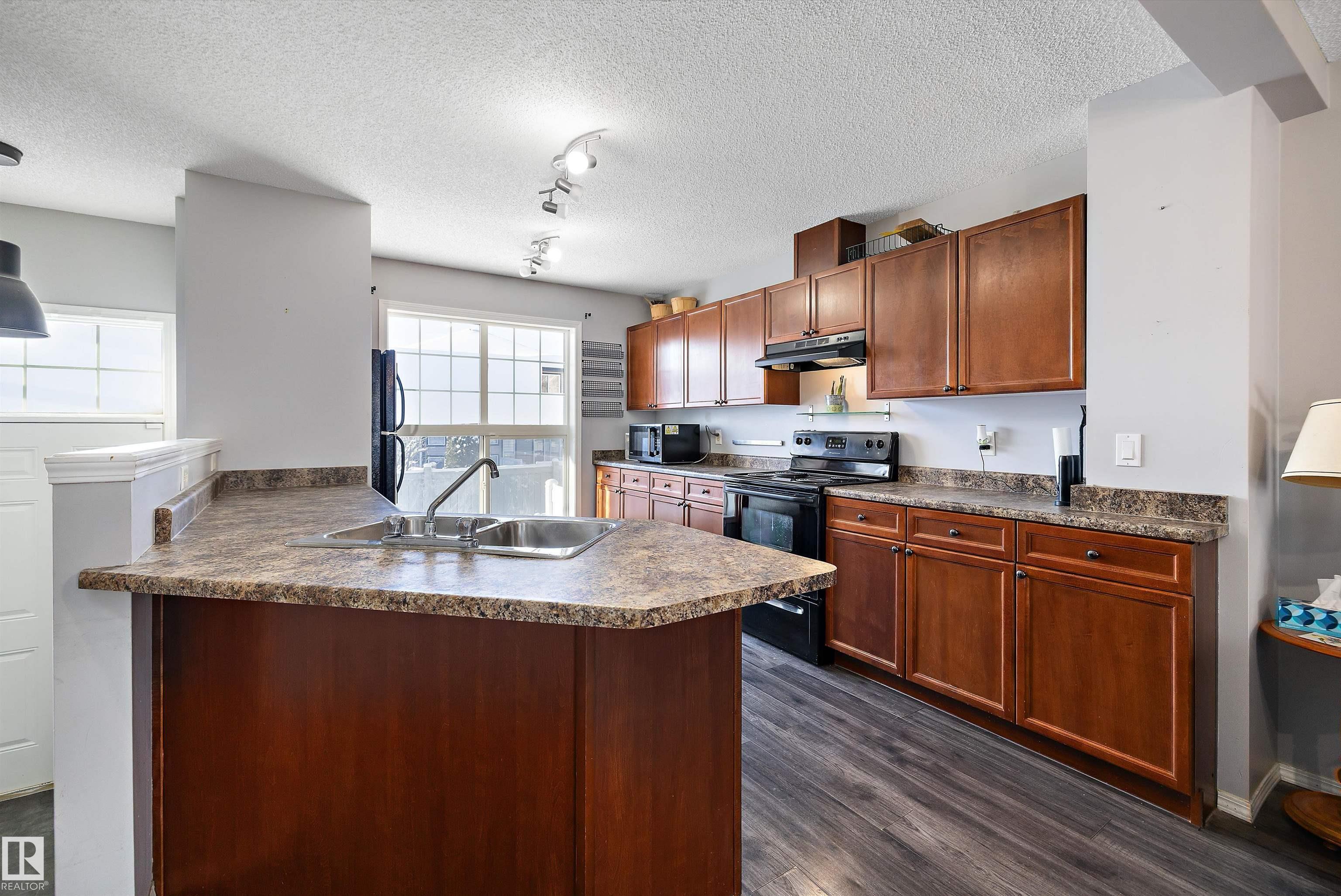 Photo 7 at 72 - 5604 199 Street NW, The Hamptons, Edmonton