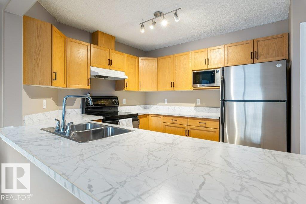 Photo 8 at 31 - 30 Levasseur Road, Heritage Lakes, St. Albert