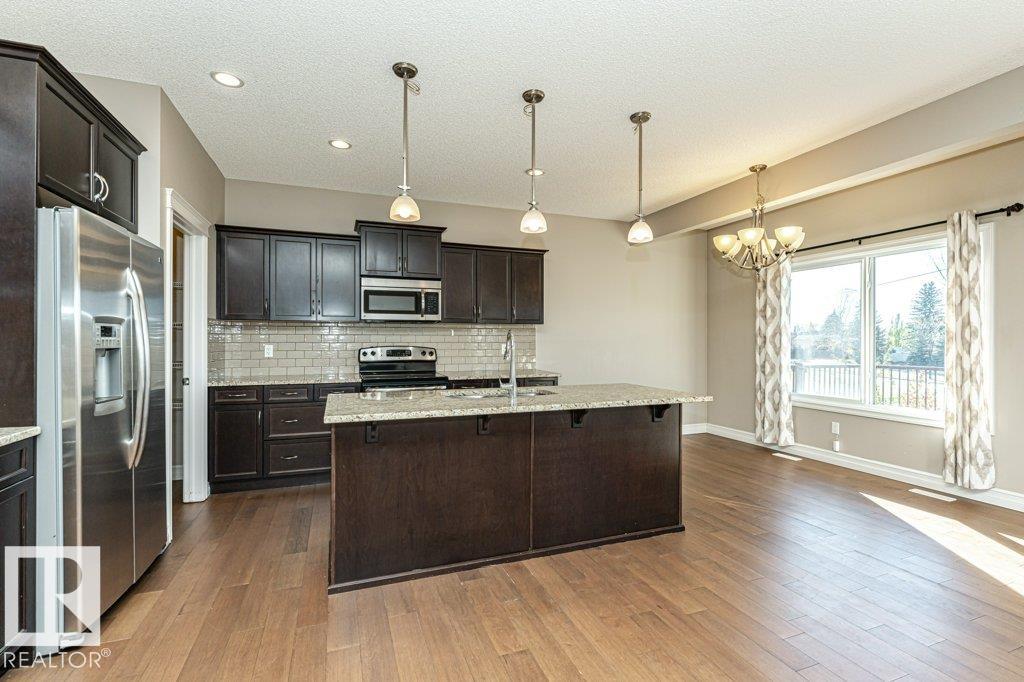 Photo 8 at 1920 33b Street NW, Laurel, Edmonton