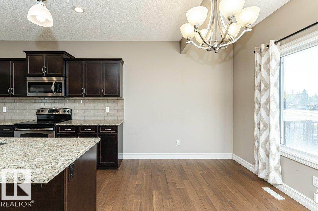 Photo 10 at 1920 33b Street NW, Laurel, Edmonton