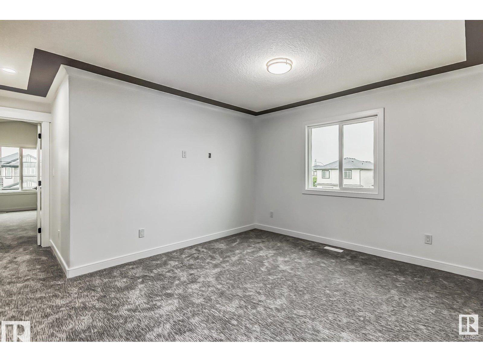 Photo 12 at 1703 152 Avenue NW, Fraser, Edmonton