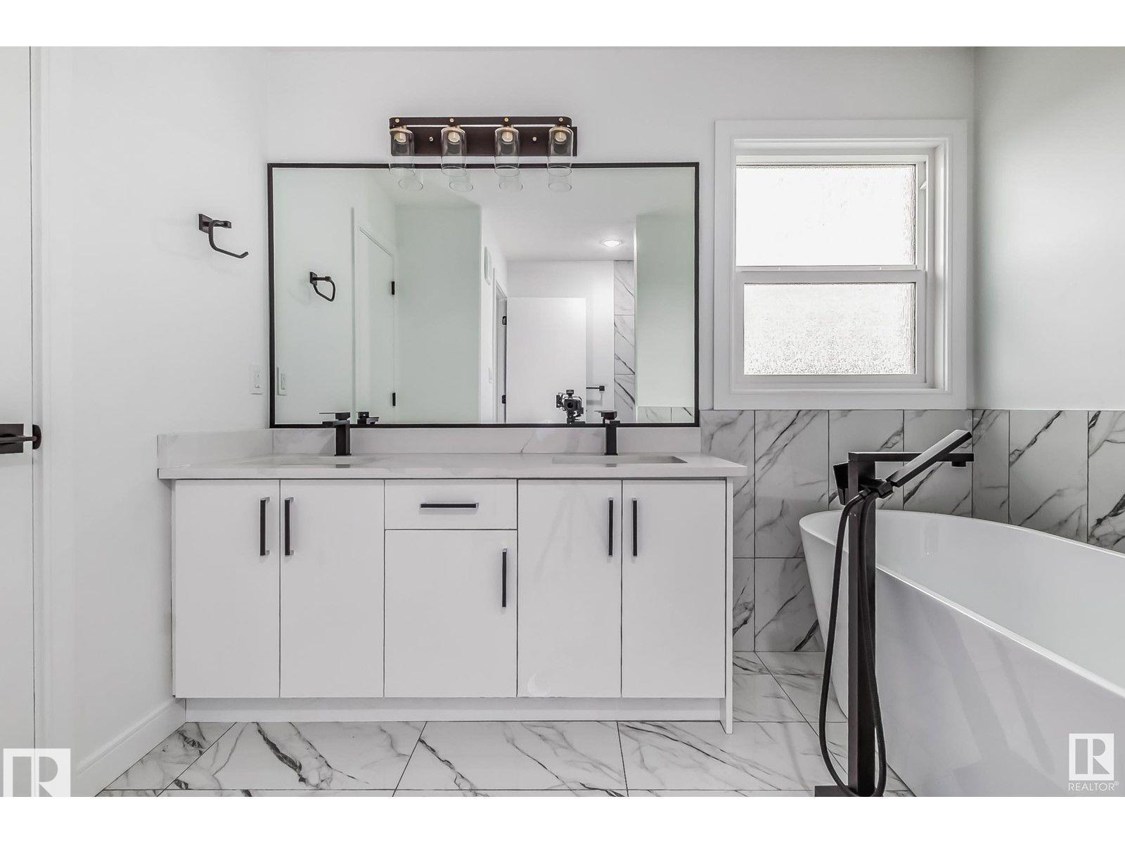 Photo 21 at 1703 152 Avenue NW, Fraser, Edmonton