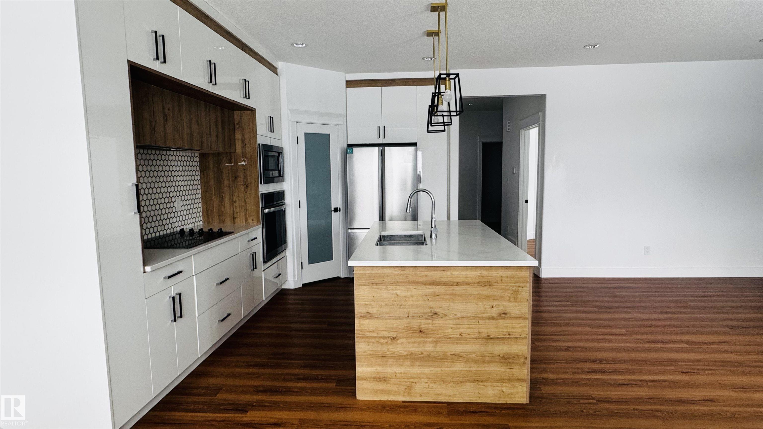 Photo 6 at 1703 152 Avenue NW, Fraser, Edmonton