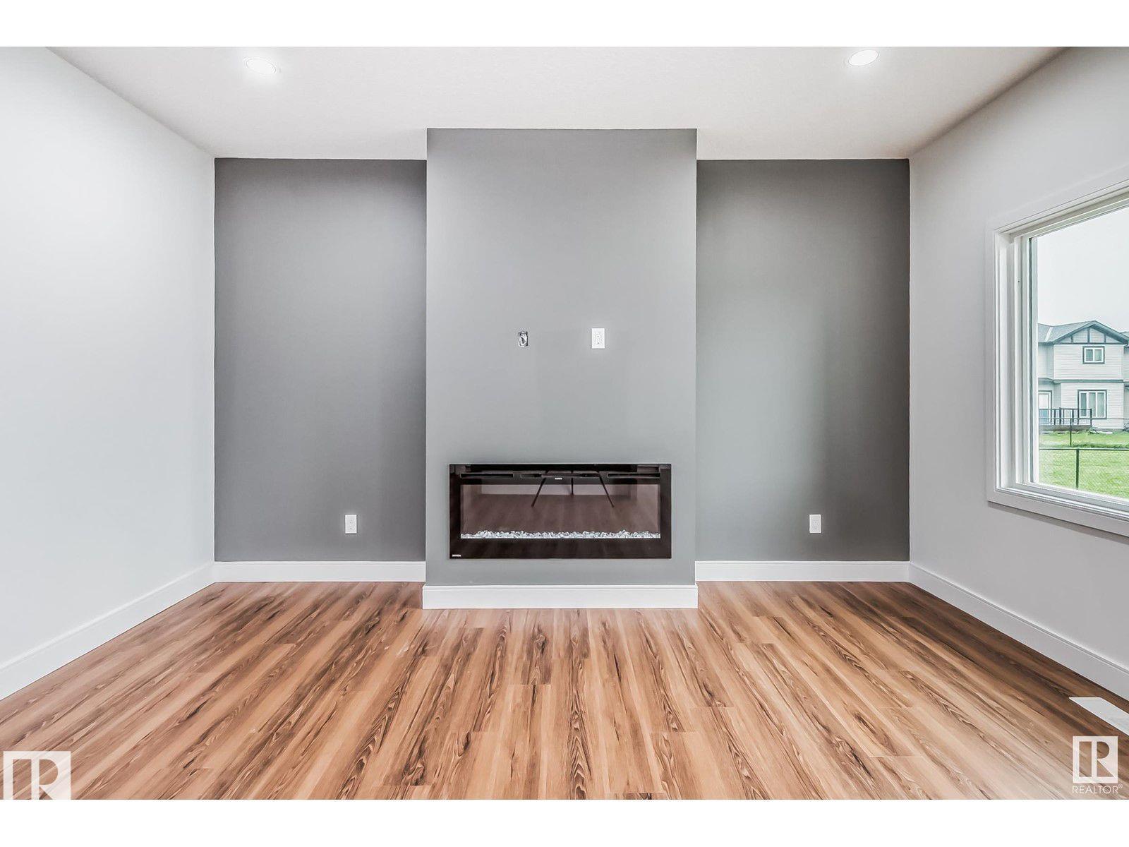 Photo 9 at 1703 152 Avenue NW, Fraser, Edmonton