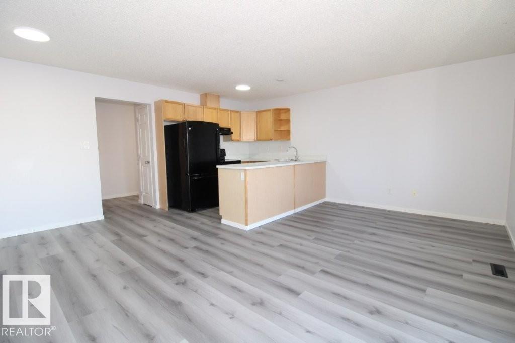 Photo 7 at 7 - 451 Hyndman Crescent NW, Canon Ridge, Edmonton