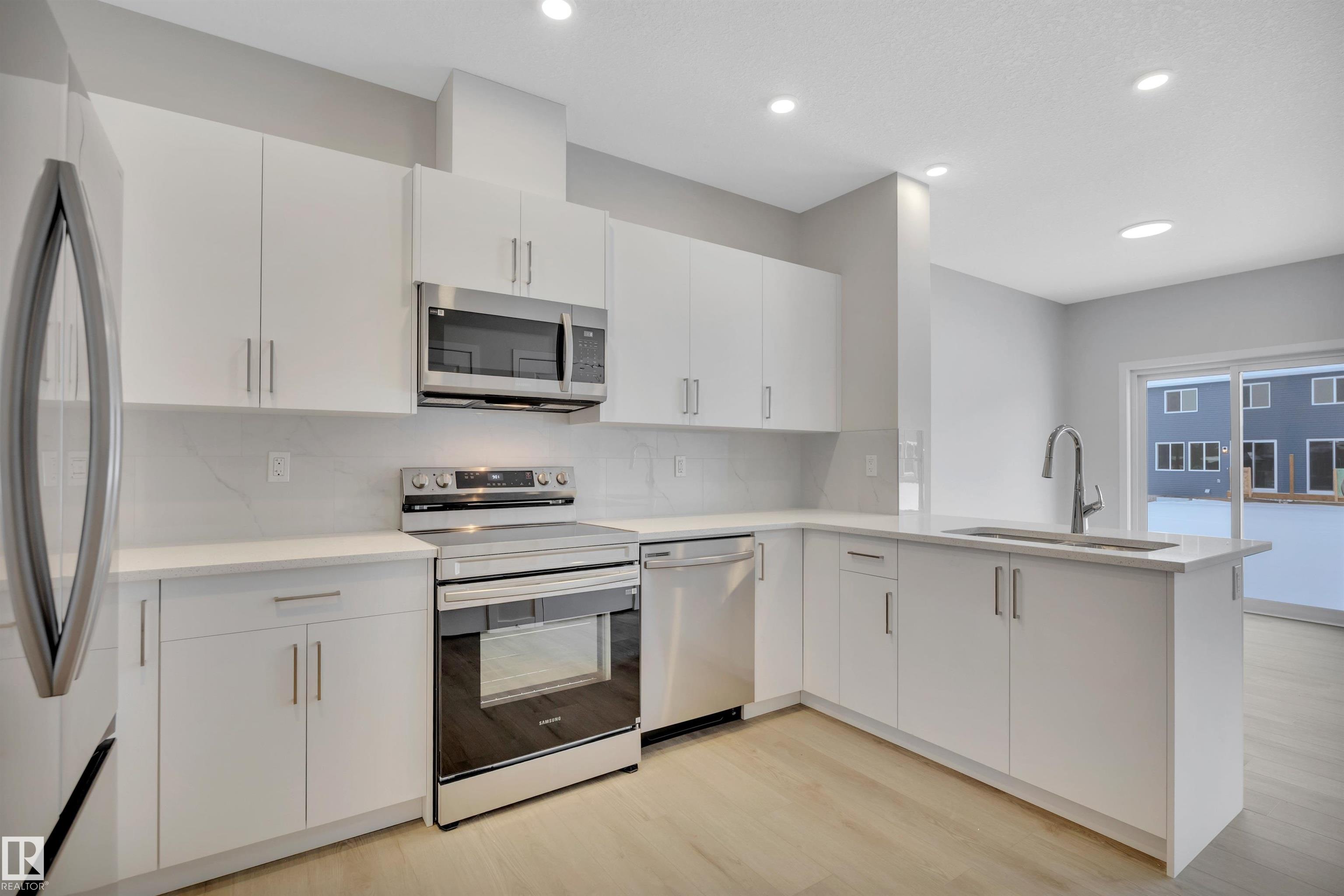 Photo 7 at 5631 Hawthorn Way SW, The Orchards At Ellerslie, Edmonton