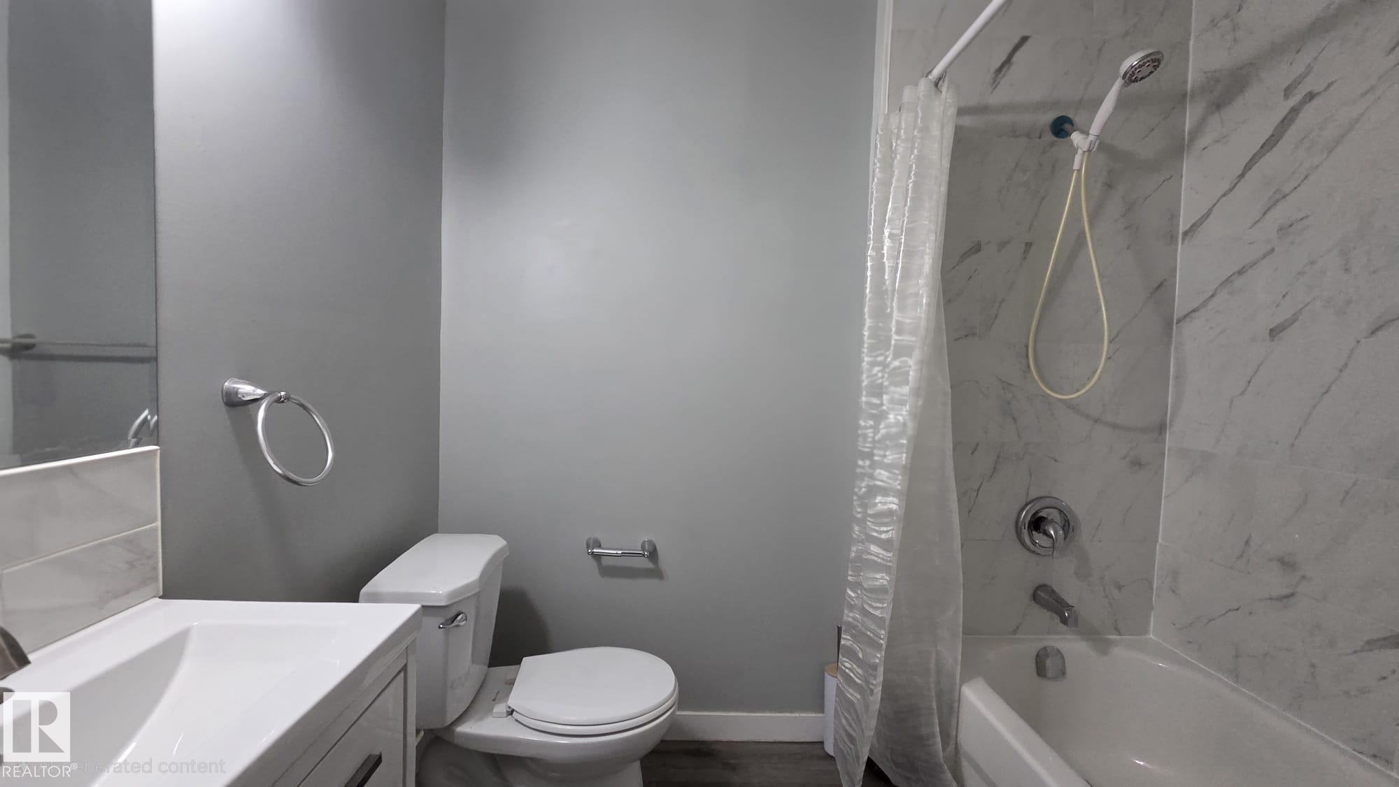 Photo 11 at 11406 82 Street NW, Parkdale, Edmonton