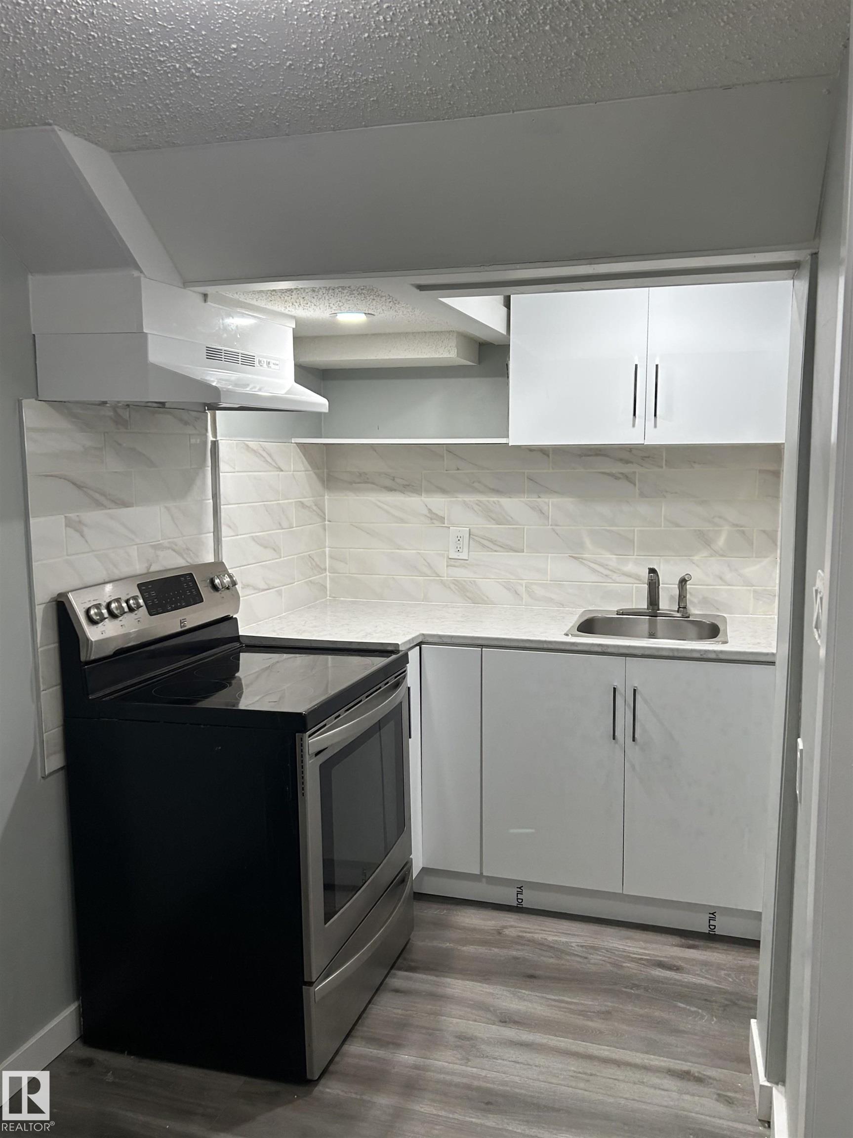 Photo 16 at 11406 82 Street NW, Parkdale, Edmonton