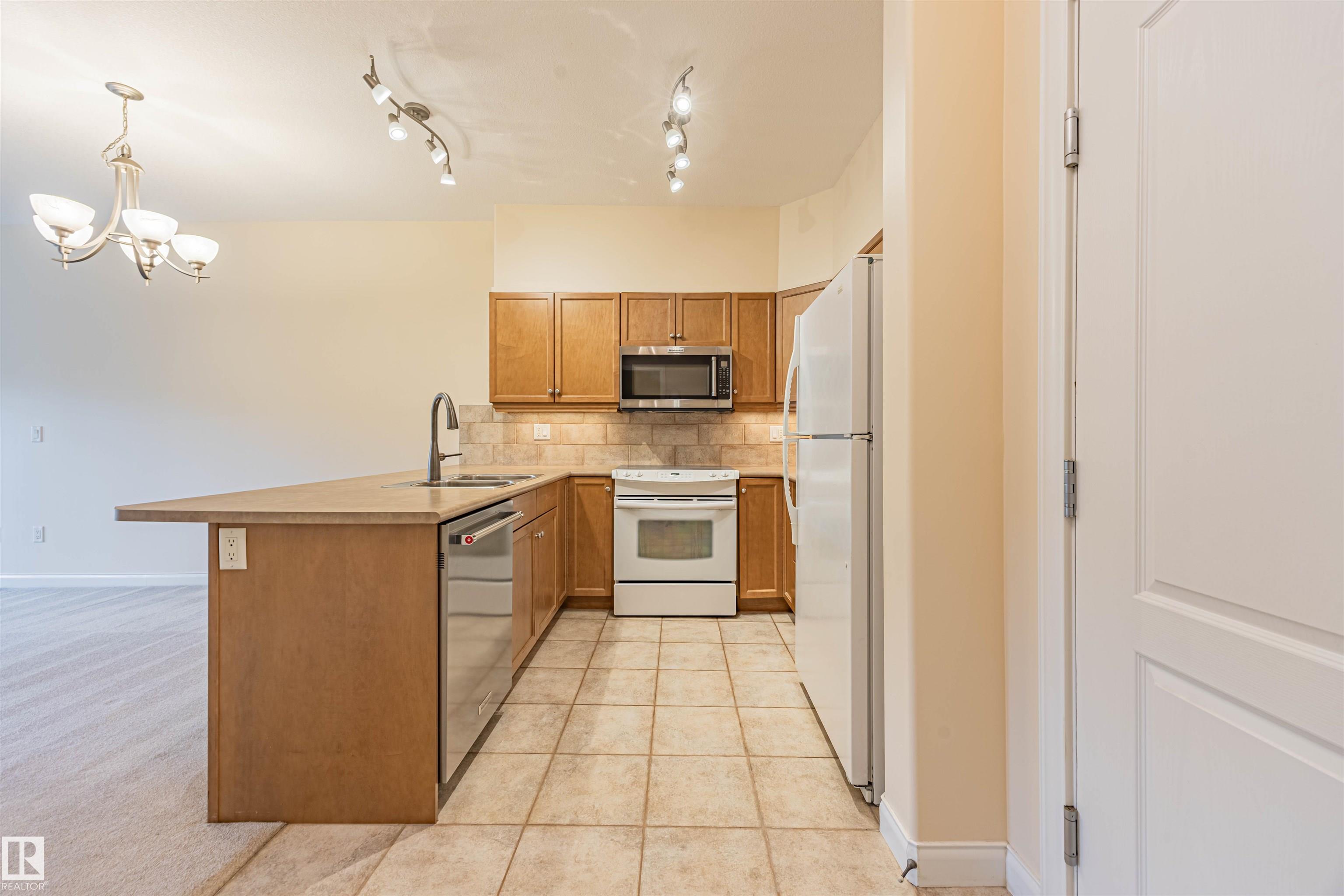 Picture for #110 1406 HODGSON WY NW