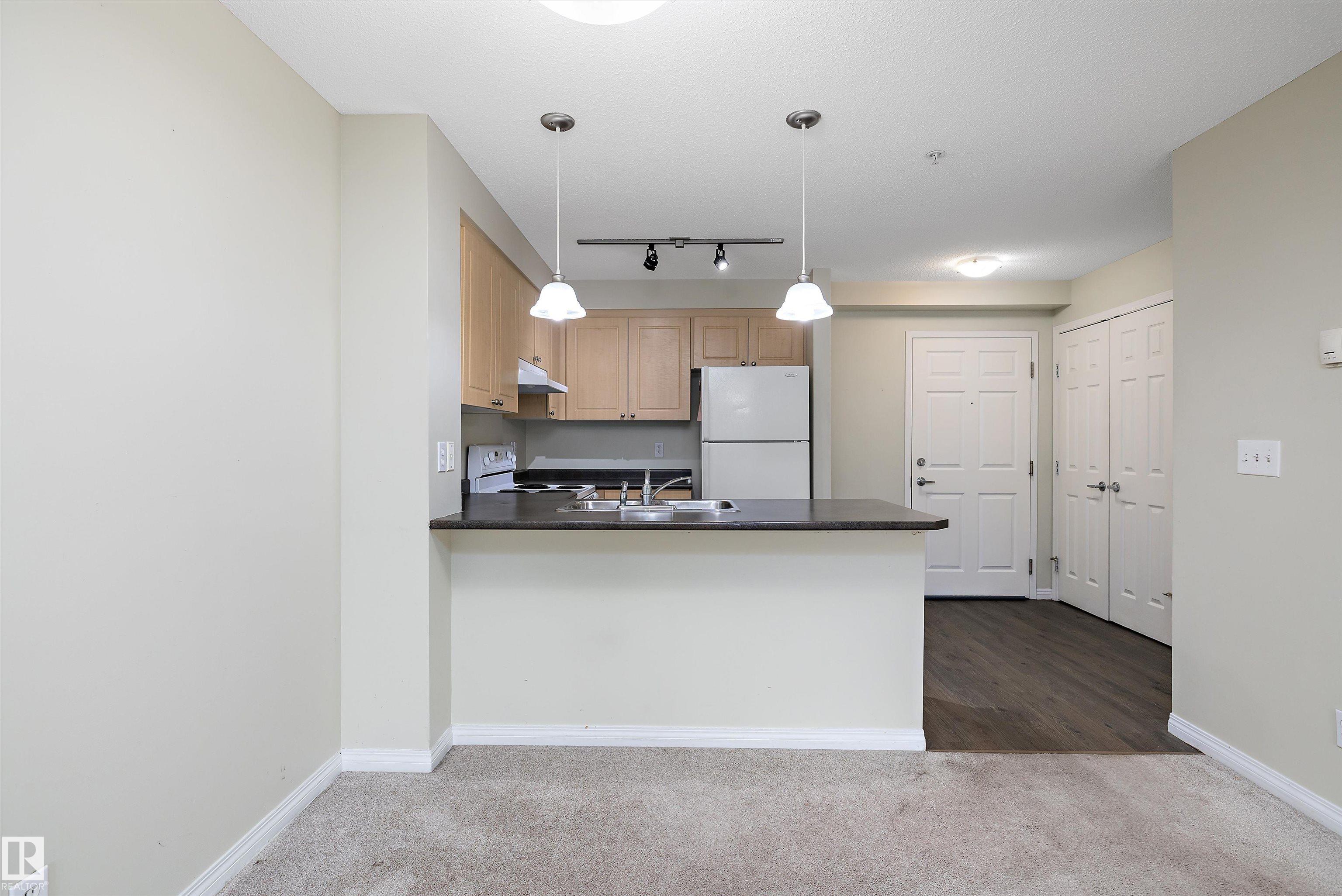 Photo 4 at 213 - 636 Mcallister Loop SW, Macewan, Edmonton