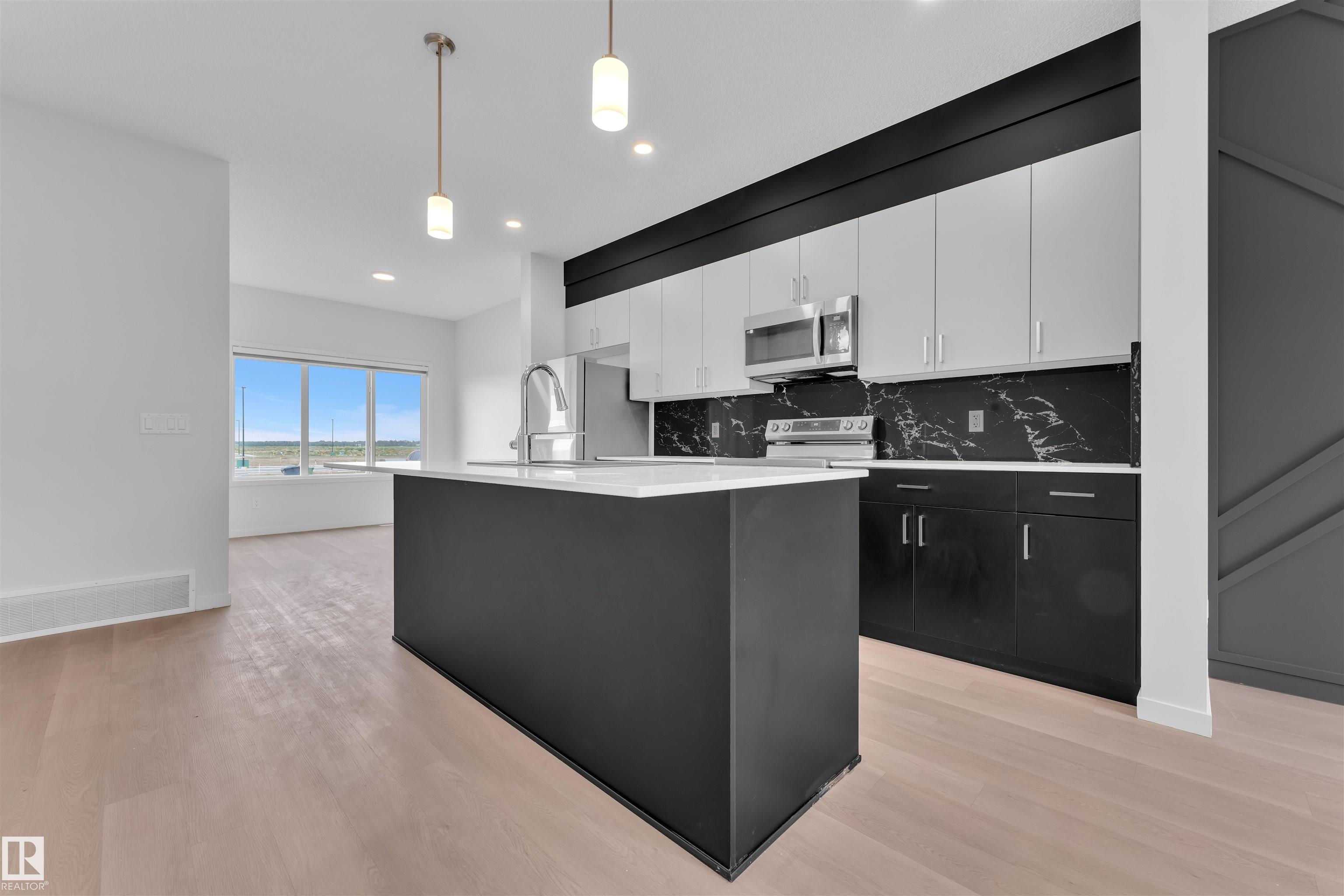 Photo 10 at 7129 - 7129 46a Street, Le Reve, Beaumont