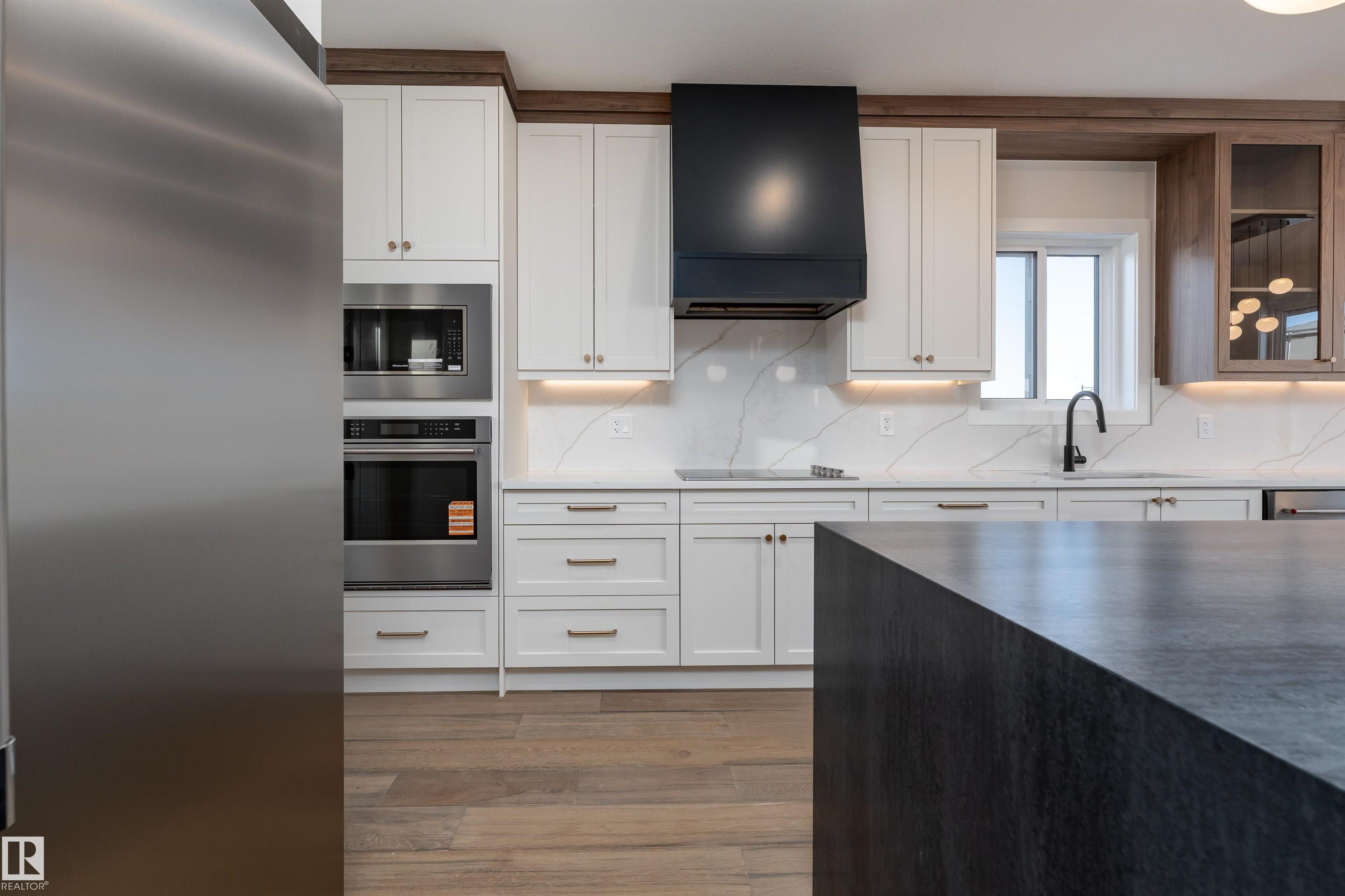 Photo 5 at 7077 Kiviaq Crescent SW, Keswick, Edmonton