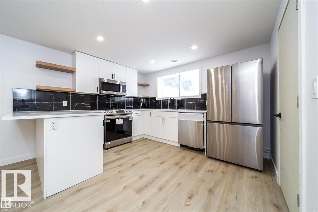 Photo 22 at 11523 82 Street NW, Parkdale, Edmonton