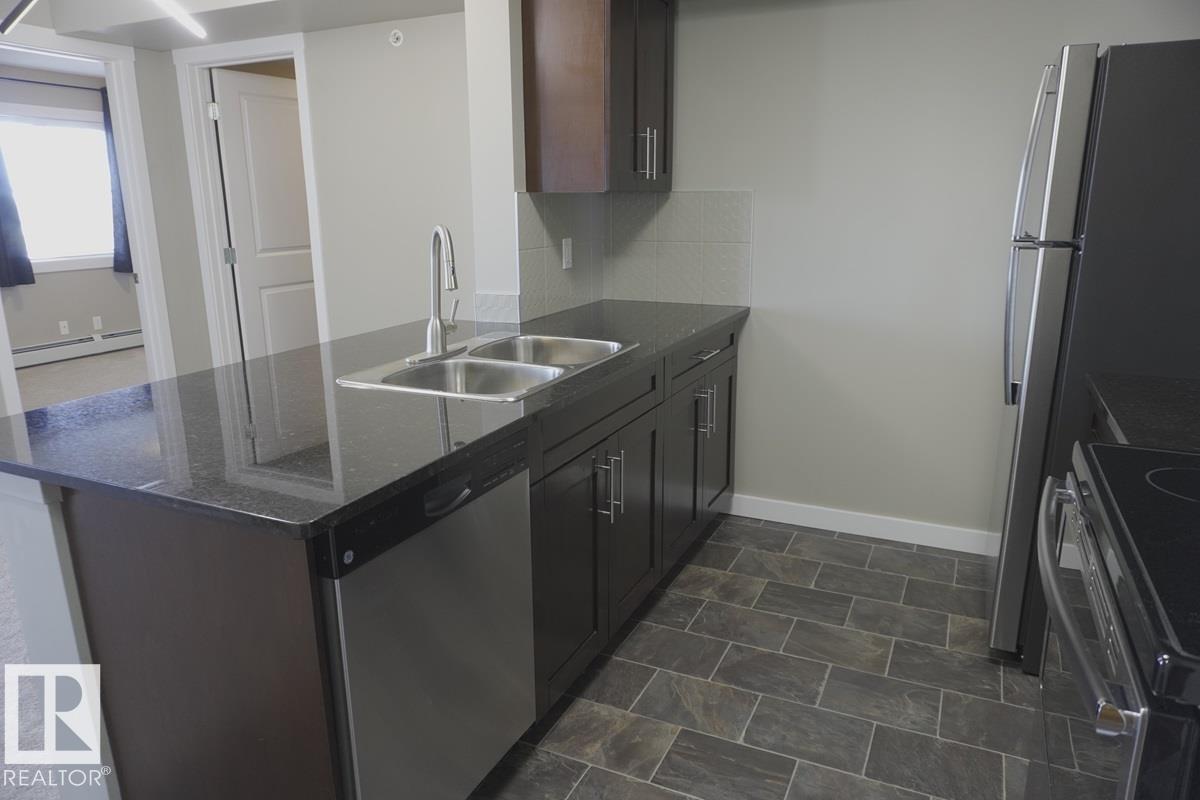 Picture for #409 5810 MULLEN PL NW