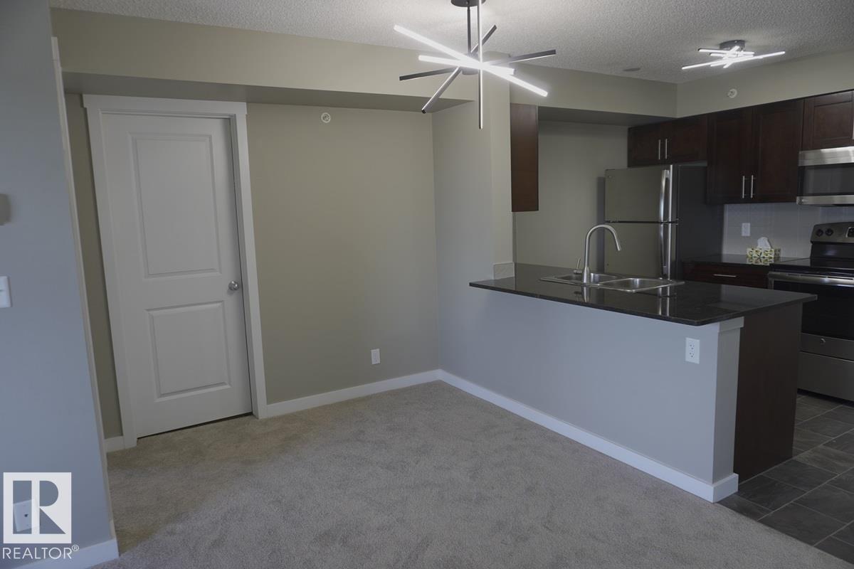 Picture for #409 5810 MULLEN PL NW