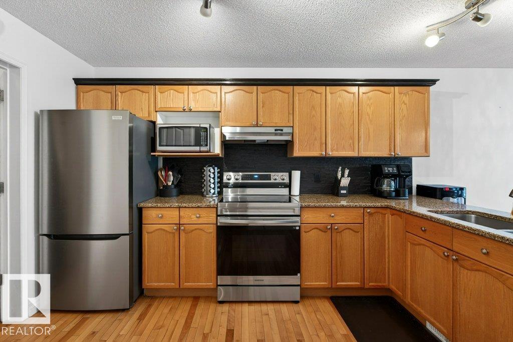 Photo 14 at 457 Rainbow Crescent, Regency Park, Sherwood Park