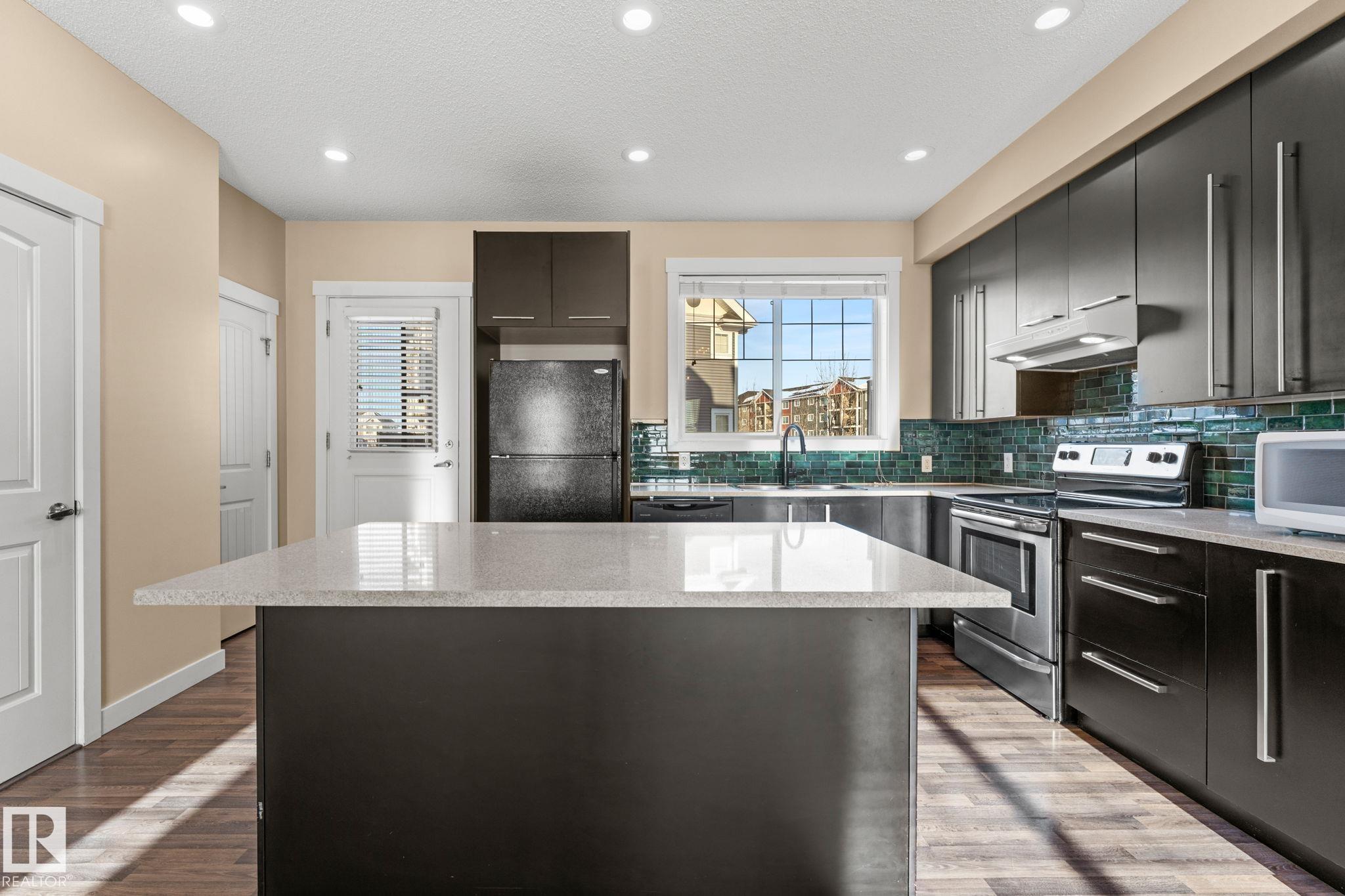 Photo 8 at 30 - 8315 180 Avenue NW, Klarvatten, Edmonton