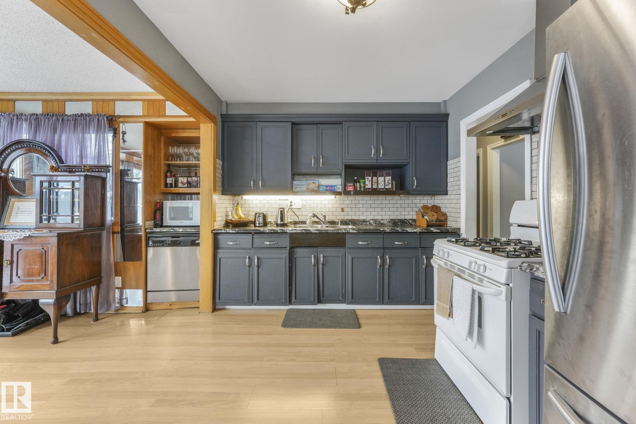 Photo 7 at 12032 55 Street NW, Newton, Edmonton