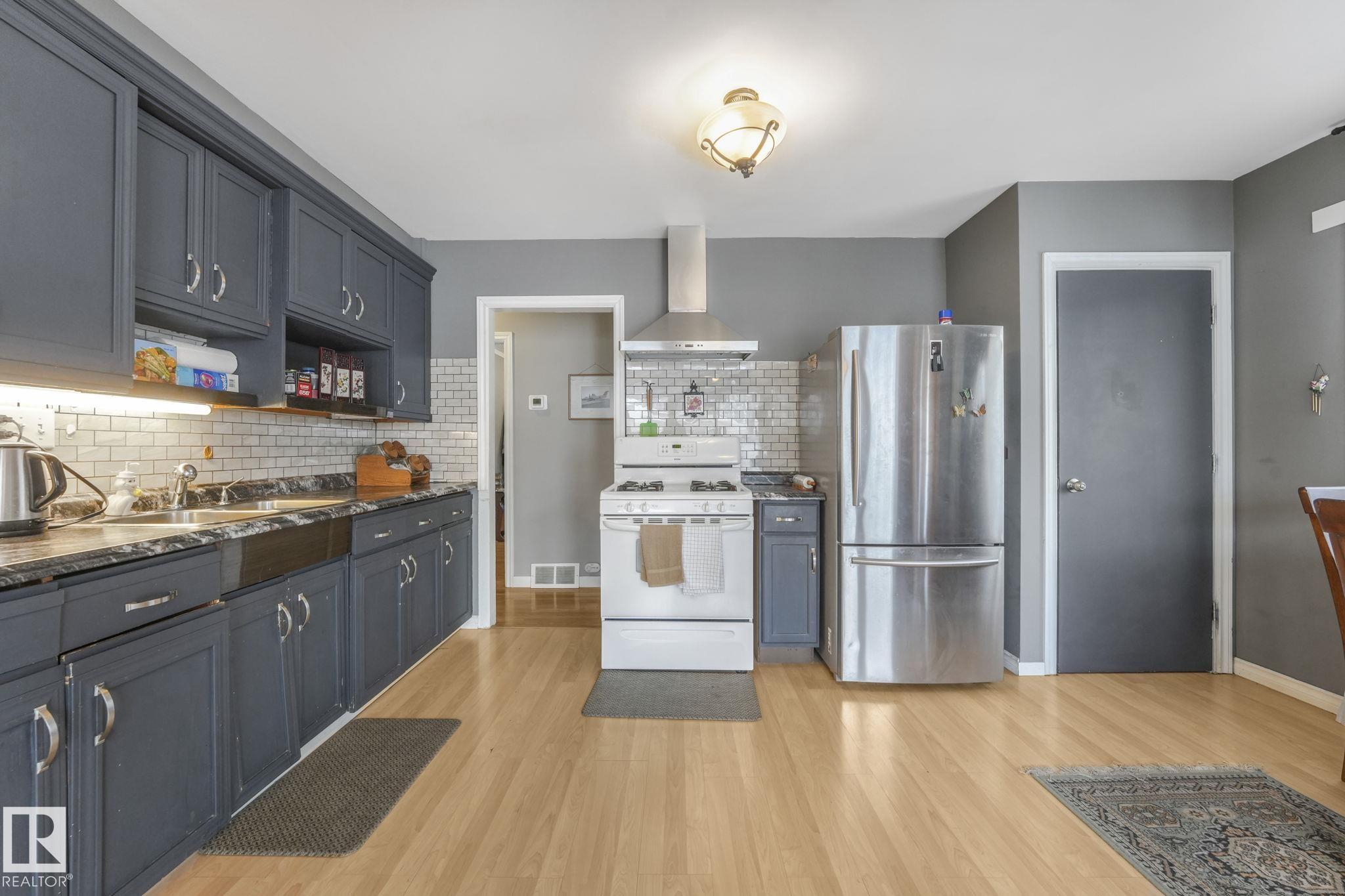 Photo 8 at 12032 55 Street NW, Newton, Edmonton