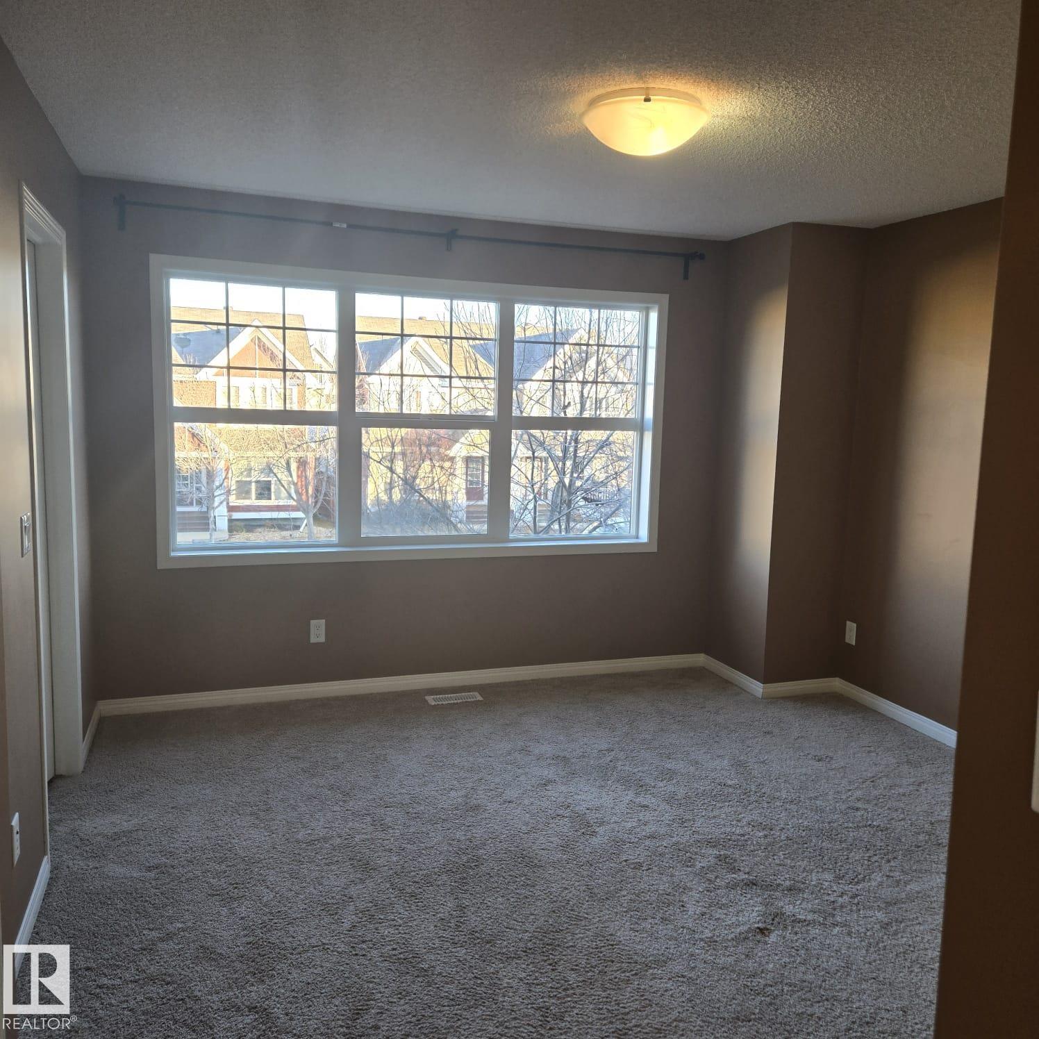 Photo 11 at 7315 22 Avenue SW, Summerside, Edmonton