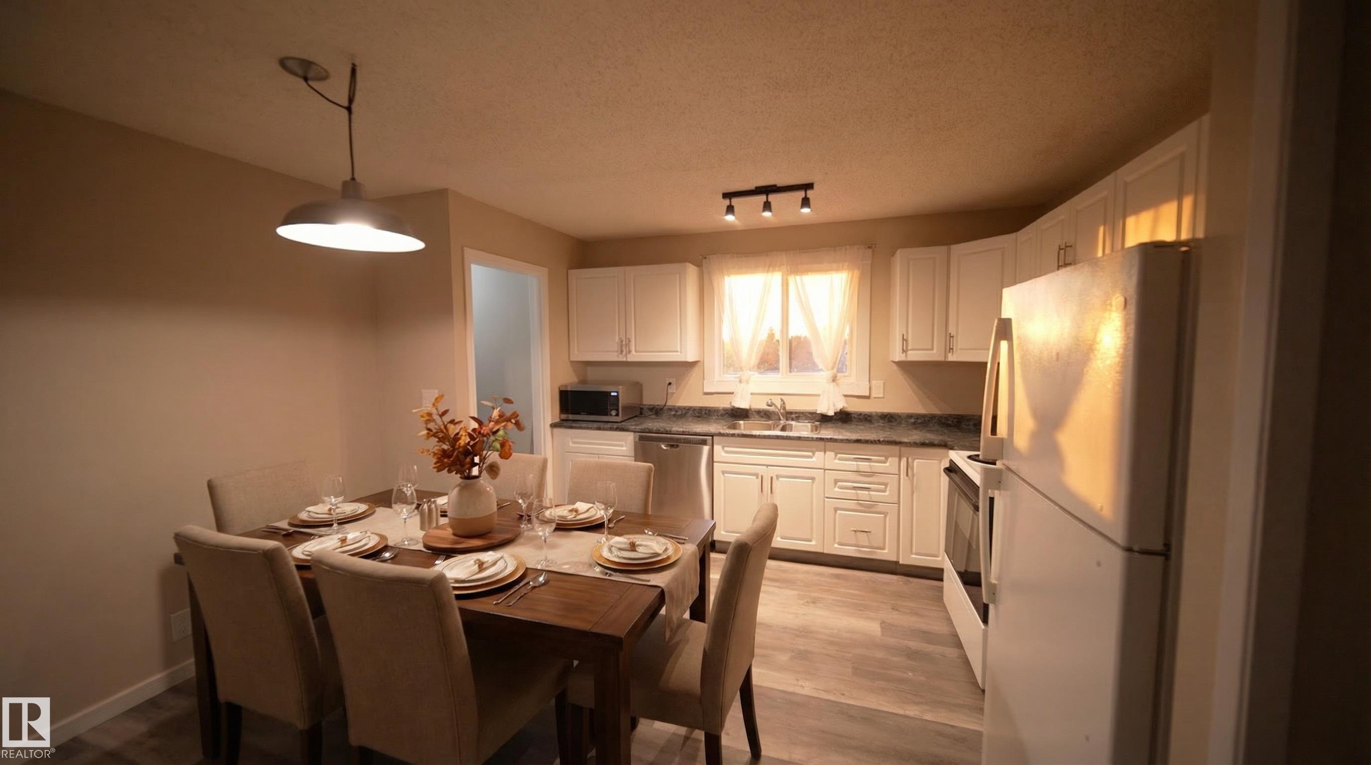 Photo 11 at 2311 146 Avenue NW, Fraser, Edmonton