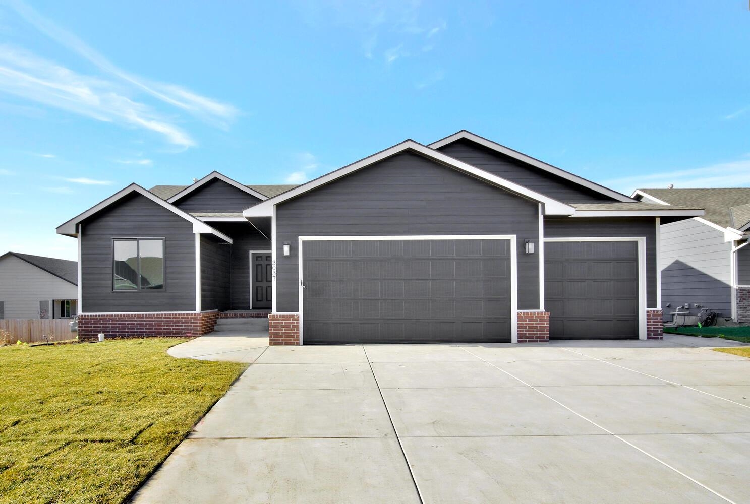 New construction residence with lots of nice amenities that include granite countertops, electric contemporary fireplace, spacious covered deck, patio, midlevel walkout, sprinkler system, irrigation well and sod included in price.