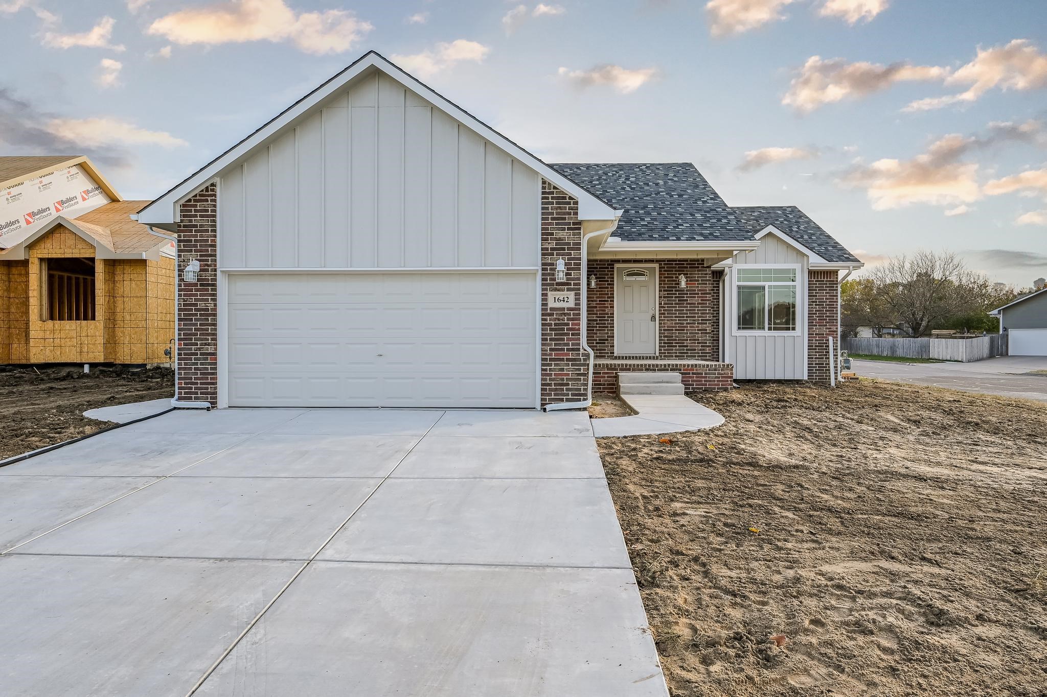 Brand new built home in Southeast Wichita. 4 bedroom, 3 bath,  2 attached car garage, covered deck, 