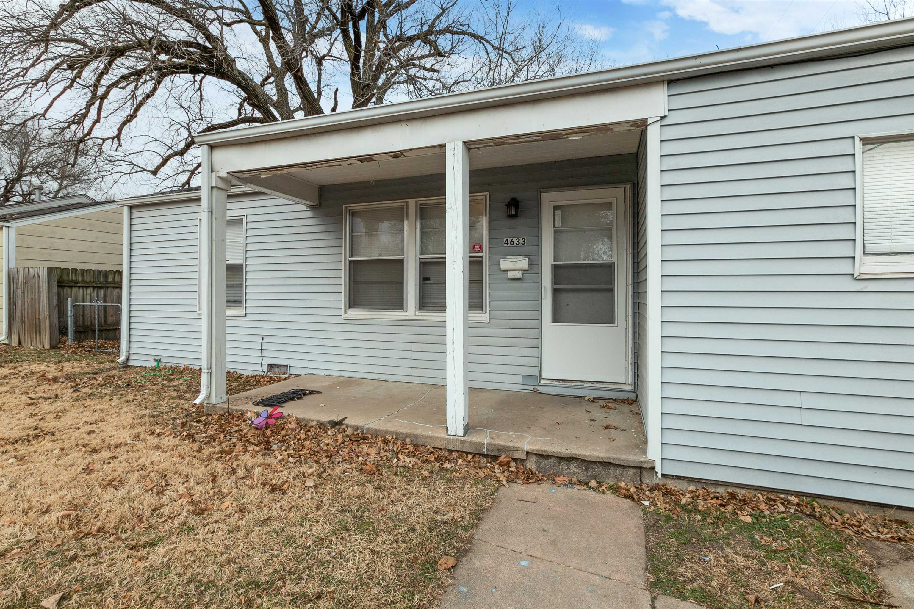 Huge garage in back! This 3 bedroom 1 bath is a spacious home with an extra bonus room and new carpe