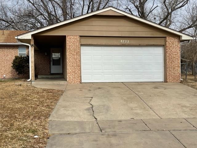 Completely remodeled interior on this twin home in SE Wichita! Features 3 bedrooms, 2 full baths, bo