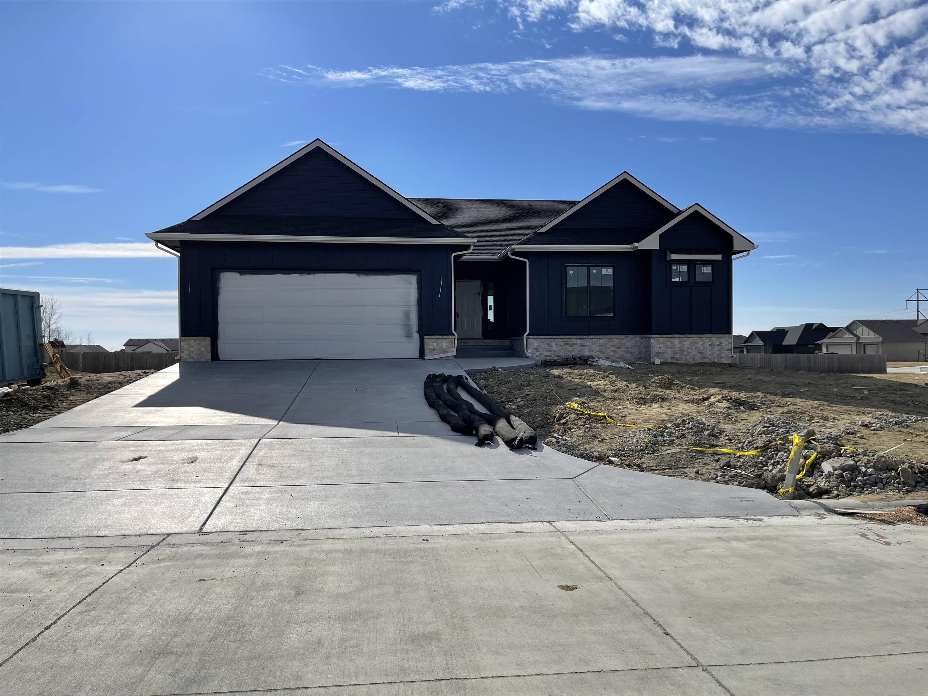 Welcome to 7169 E. Pheasant Ridge! This new home packs in many great amenities and features, and is 