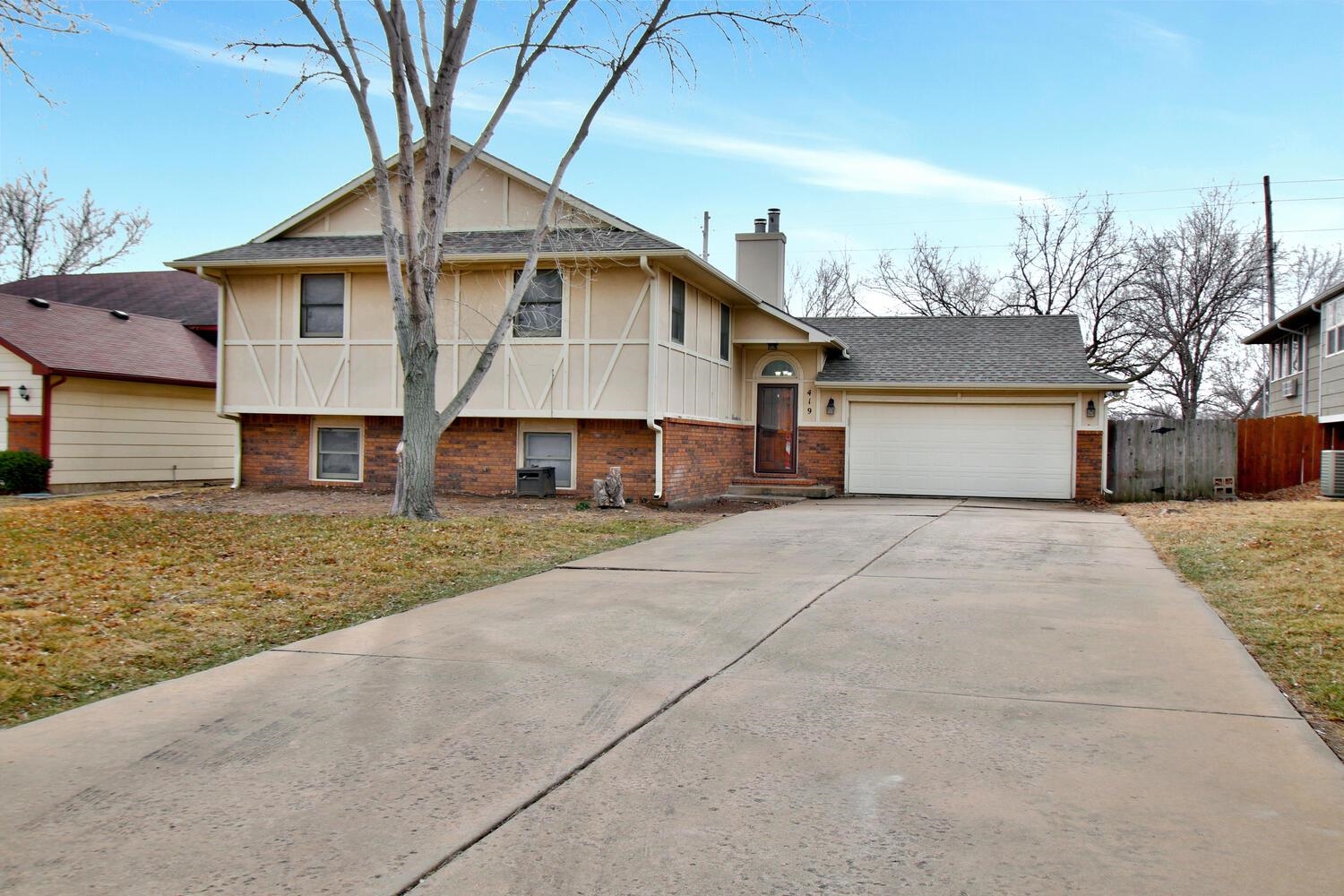 This beautiful 5 bedroom, 3 bath, 2 car garage home nestled in the heart of Derby, KS. As you walk i